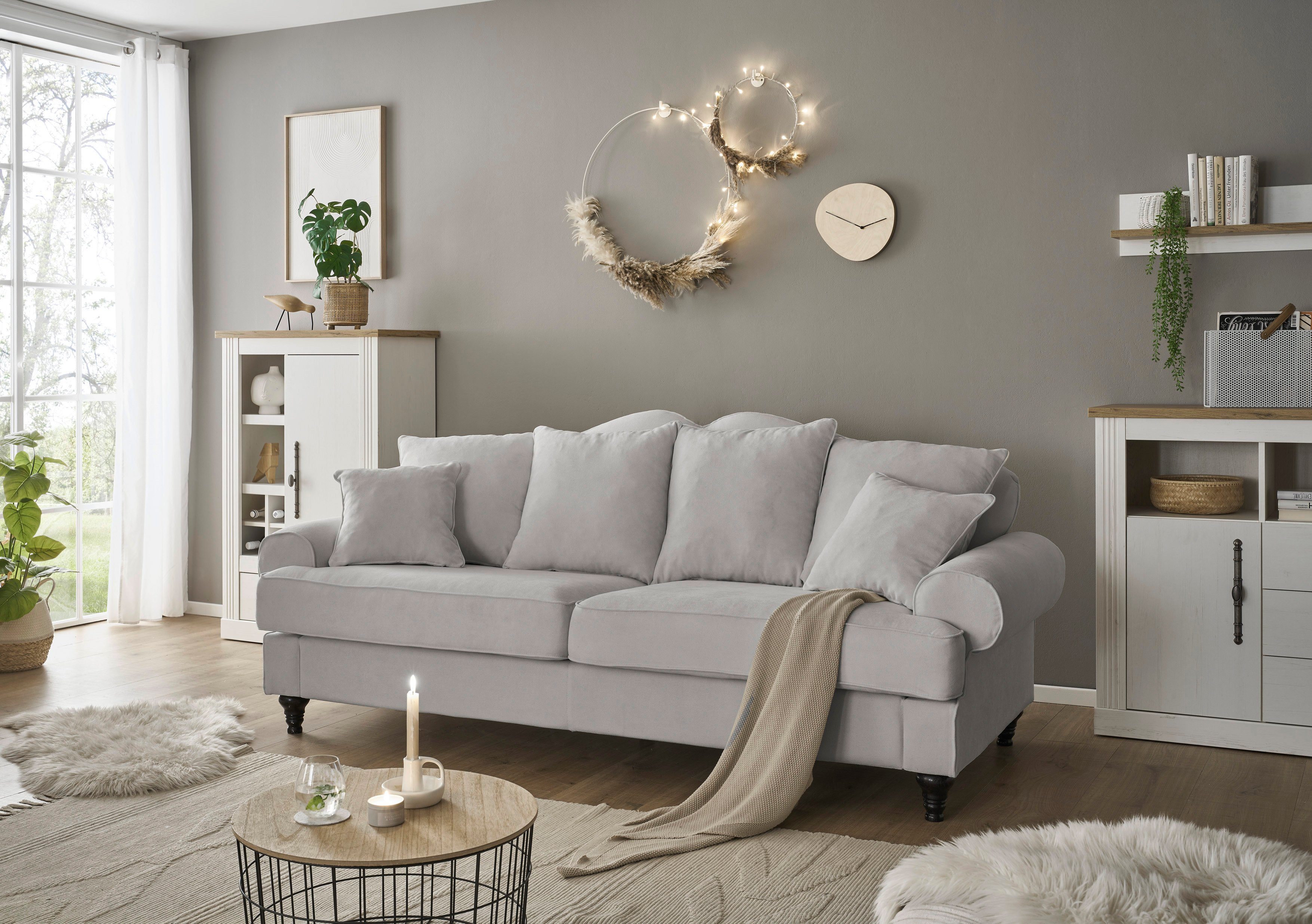 OTTO home 3,5-Sitzer Westminster, Sofa im Landhausstil, Couch mit Zierkissen, Federkern-Polsterung, gedrechselter Fuß, hochwertiger Microfaserbezug