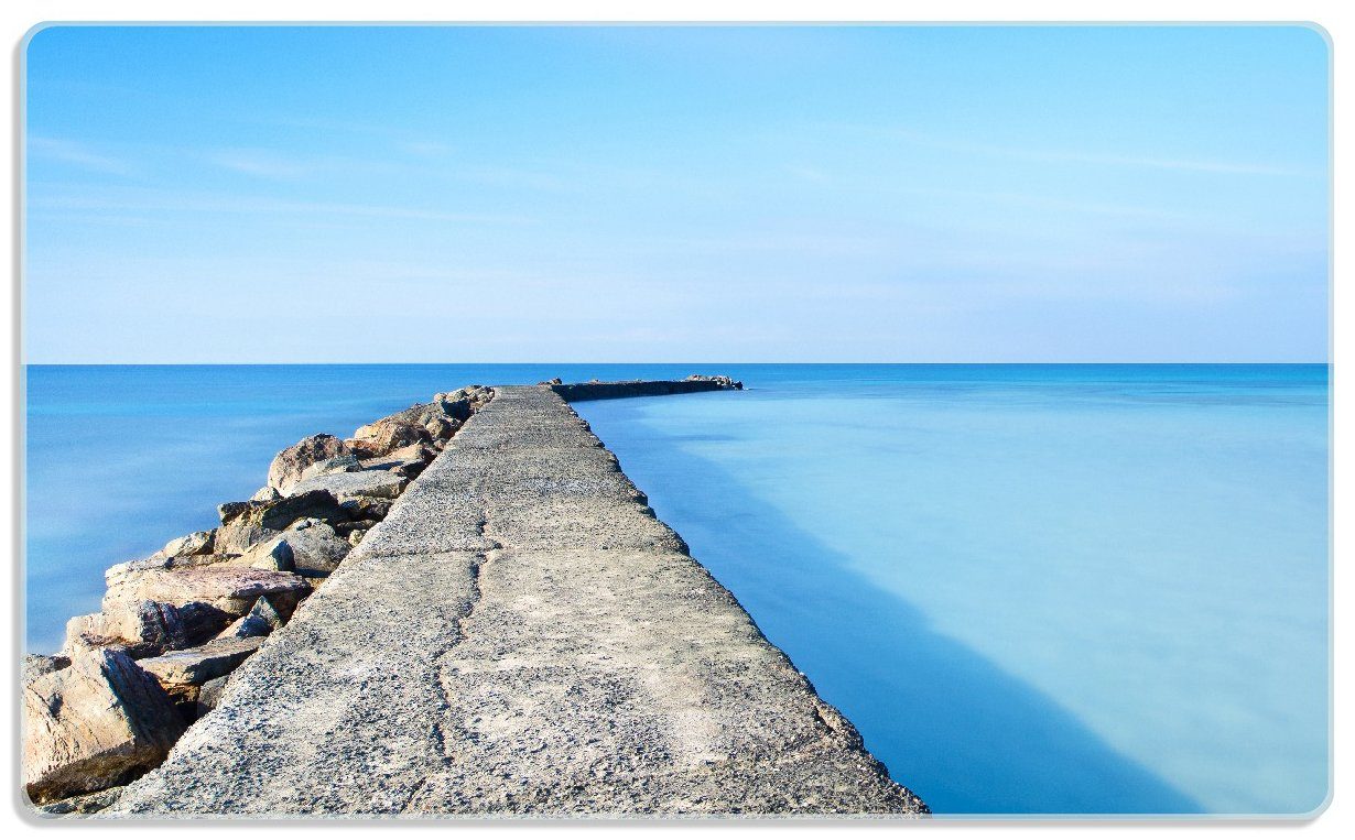 Wallario Frühstücksbrett Pier am blauen Ozean mit blauem Himmel, ESG-Sicherheitsglas, (inkl. rutschfester Gummifüße 4mm, 1-St), 14x23cm