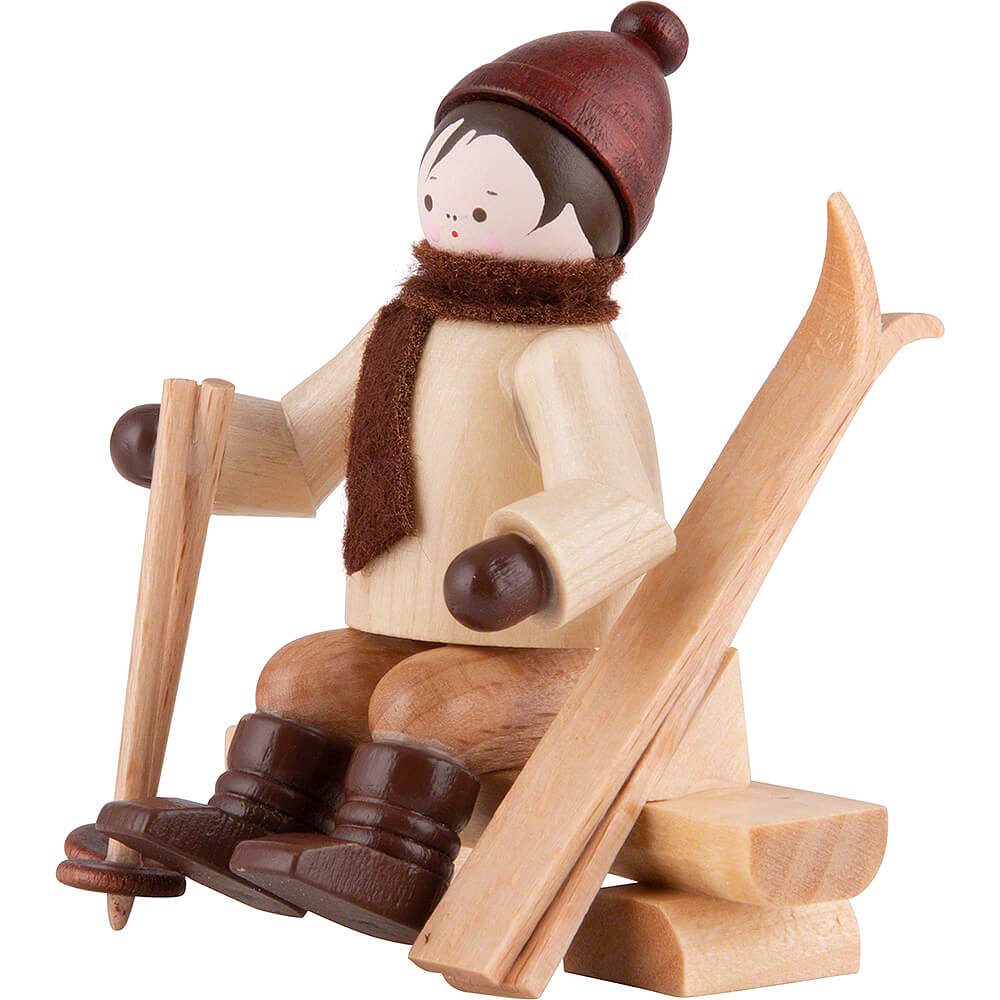 Volkskunstwerkstatt Romy Thiel Dekofigur Thiel-Figur Skifahrer auf Bank - n günstig online kaufen