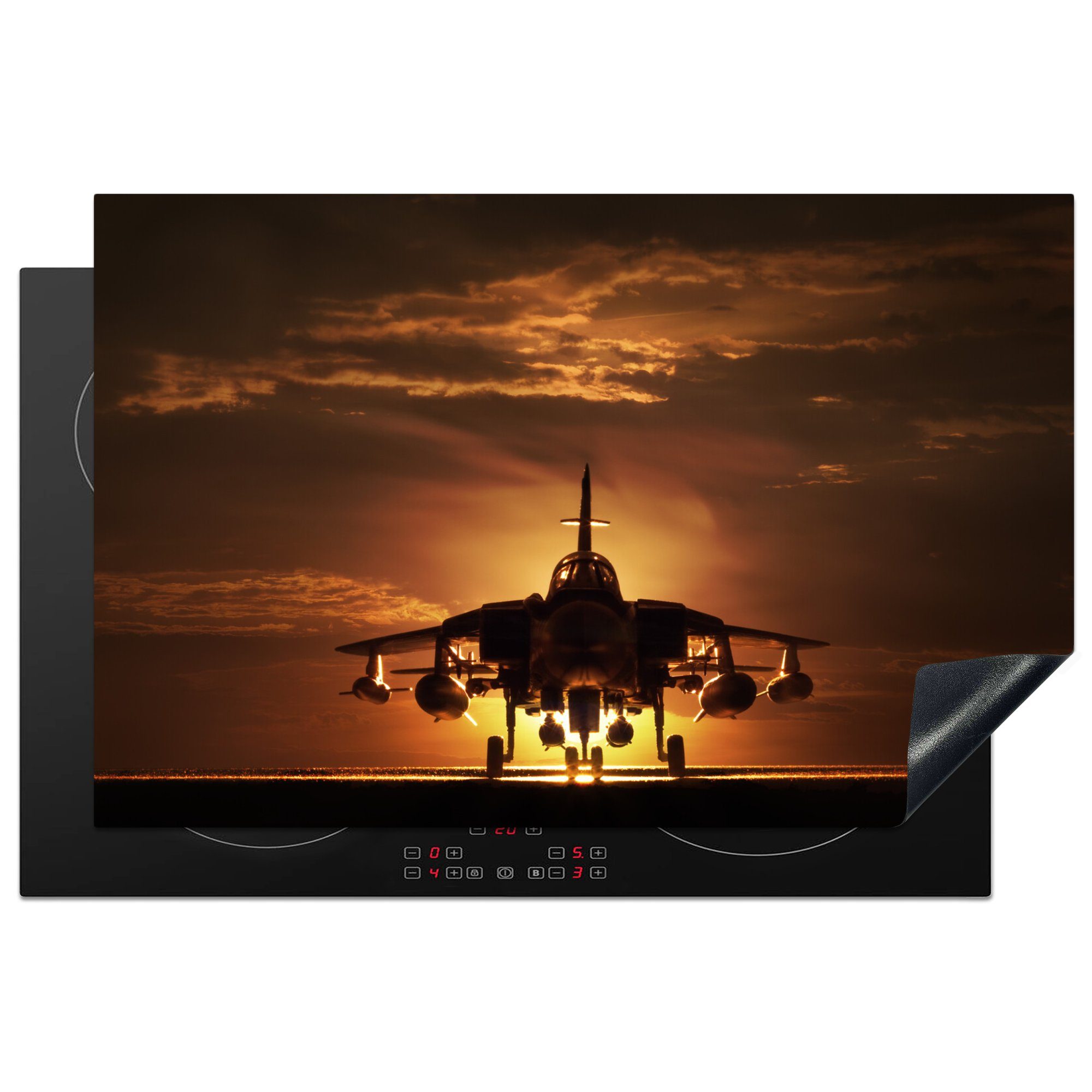 MuchoWow Herdblende-/Abdeckplatte Die Silhouette eines Kampfjets bei Sonnenuntergang, Vinyl, (1 tlg), 81x52 cm, Induktionskochfeld Schutz für die küche, Ceranfeldabdeckung