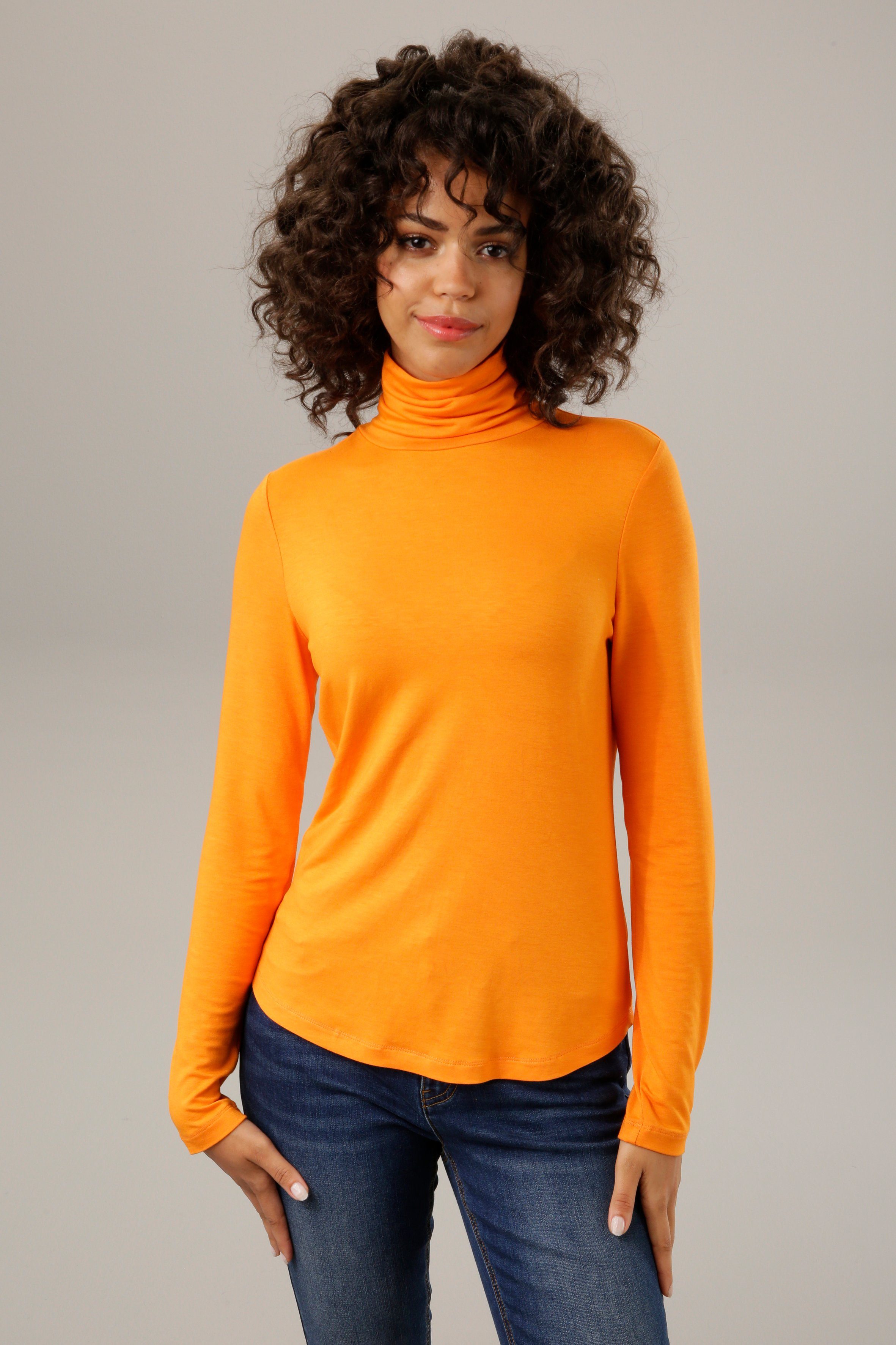 trendigen in CASUAL oder Aniston 4 Unis Rollkragenshirt orange schwarz-bunt-bedruckt