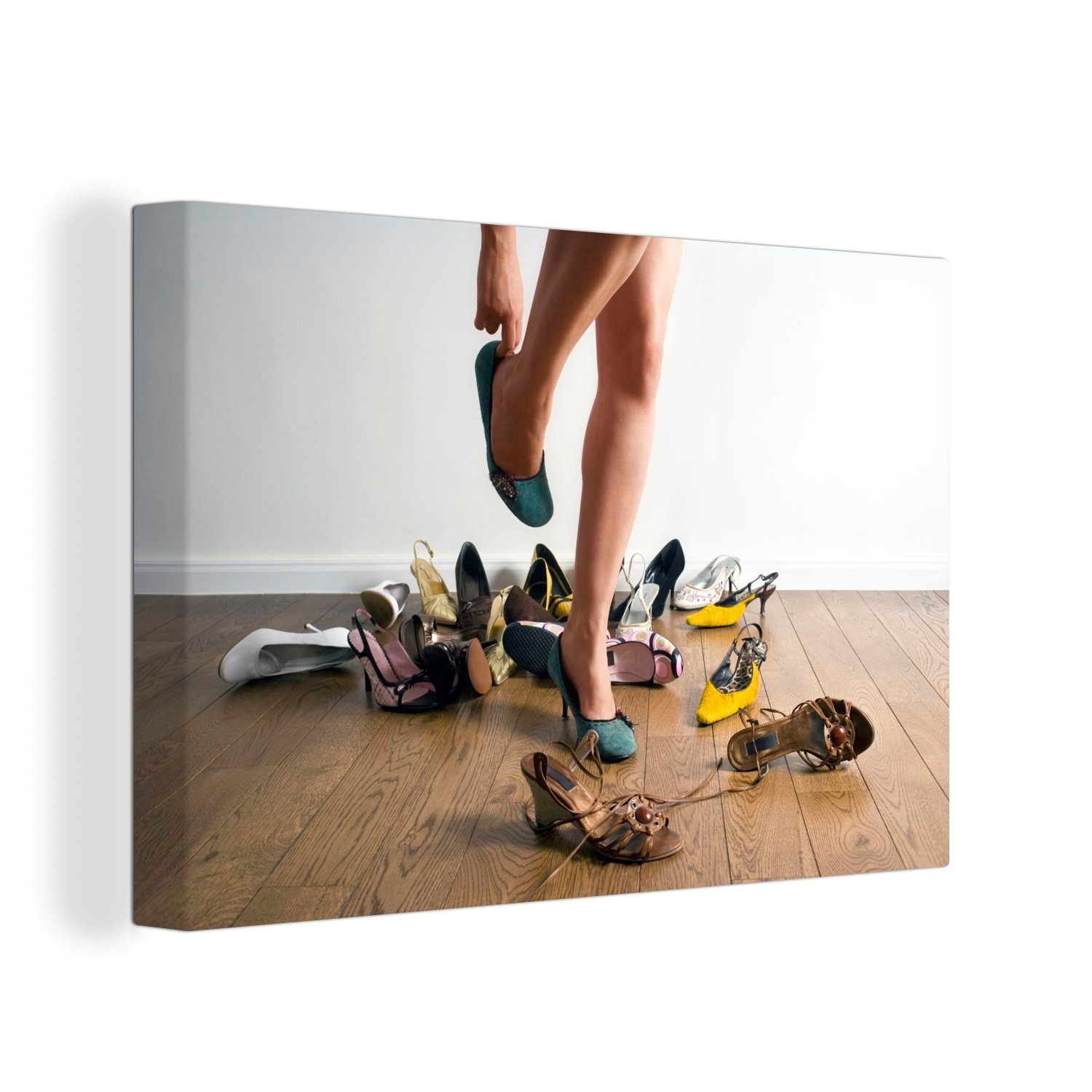 OneMillionCanvasses® Leinwandbild Von Absätzen umgebene Beine, (1 St), Wandbild Leinwandbilder, Aufhängefertig, Wanddeko, 30x20 cm