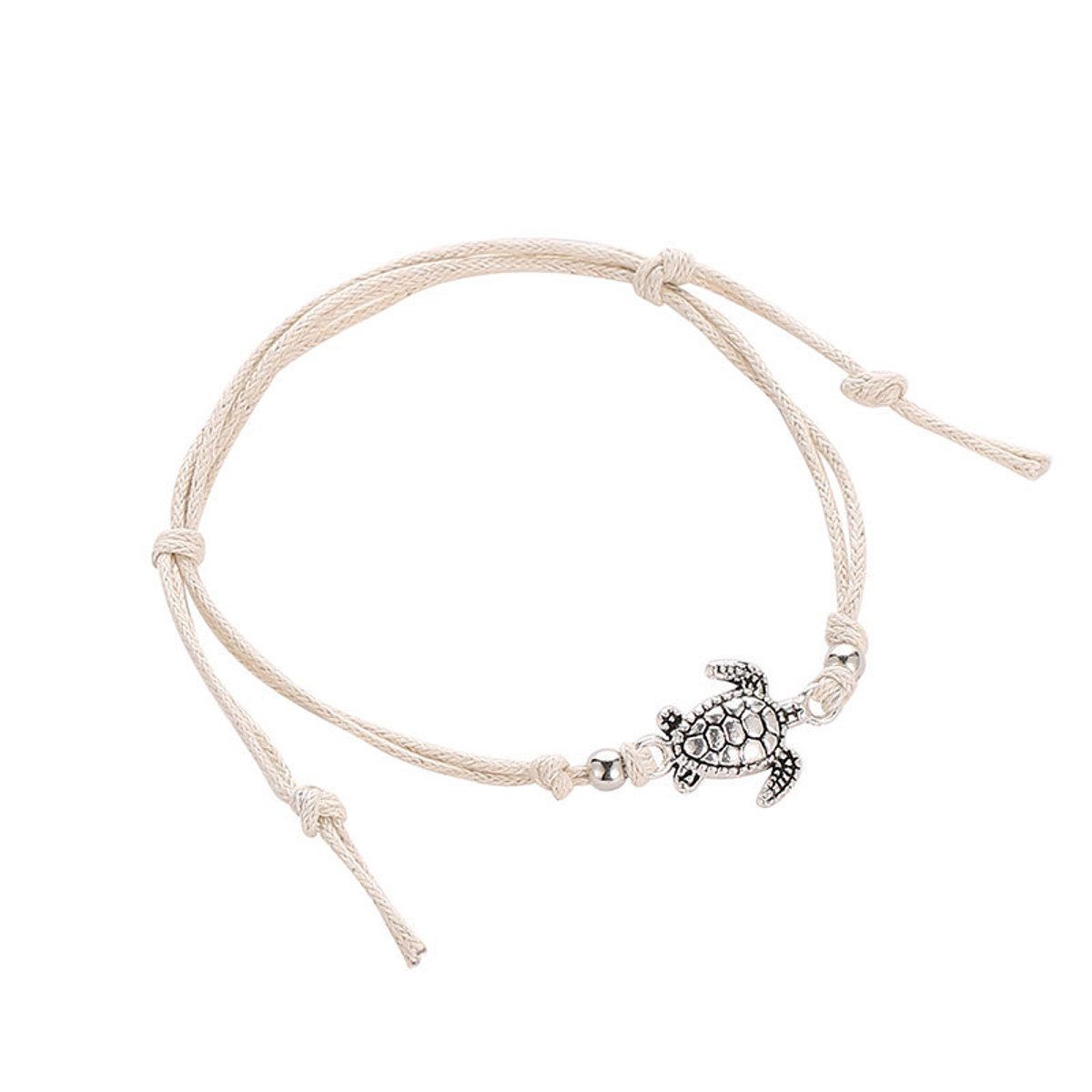 KARMA Fußkette Schildkröte Beige, Schwarz od. günstig online kaufen