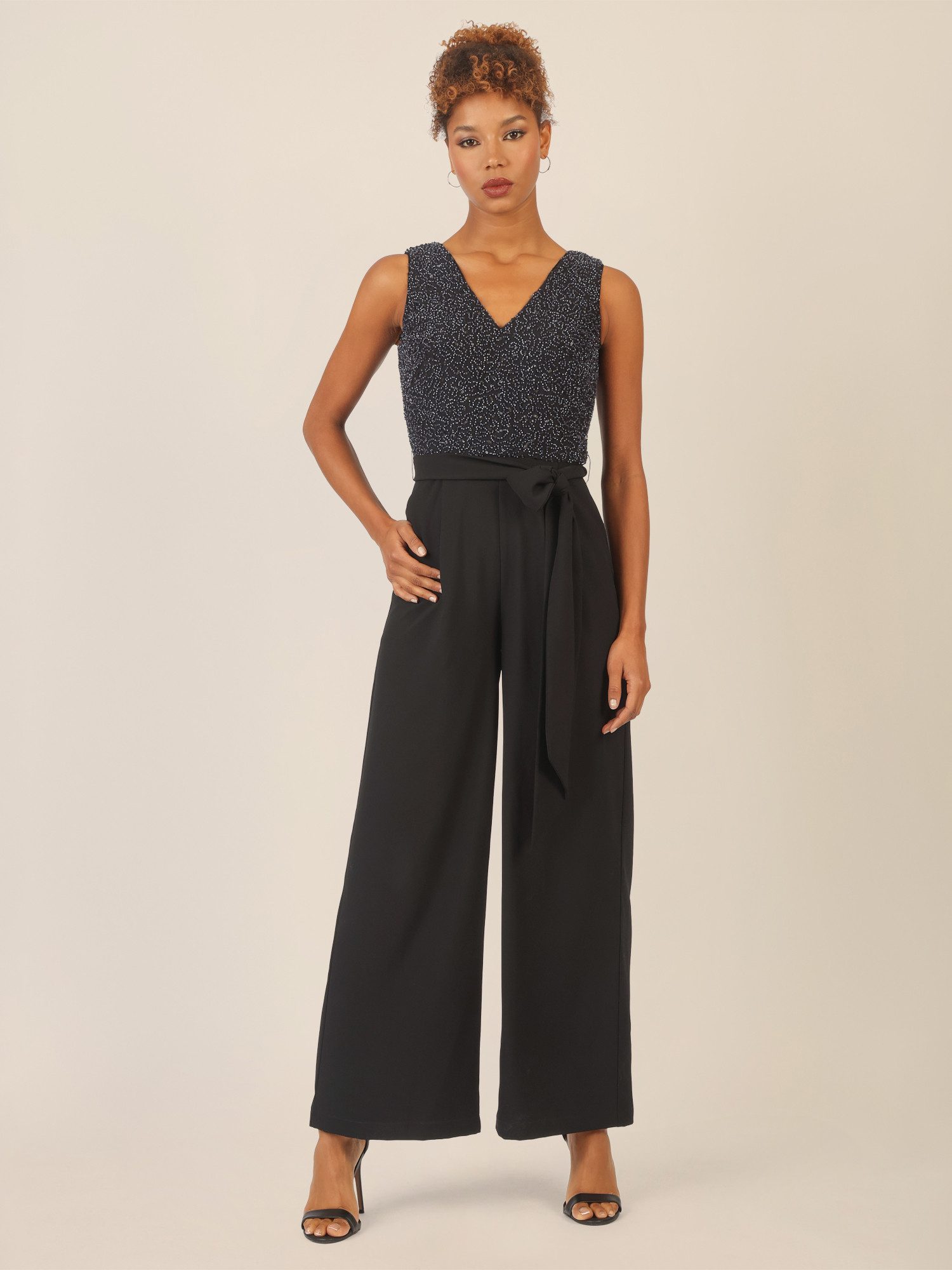 Apart Jumpsuit mit Glitzer-Oberteil und Taillenschleife günstig online kaufen