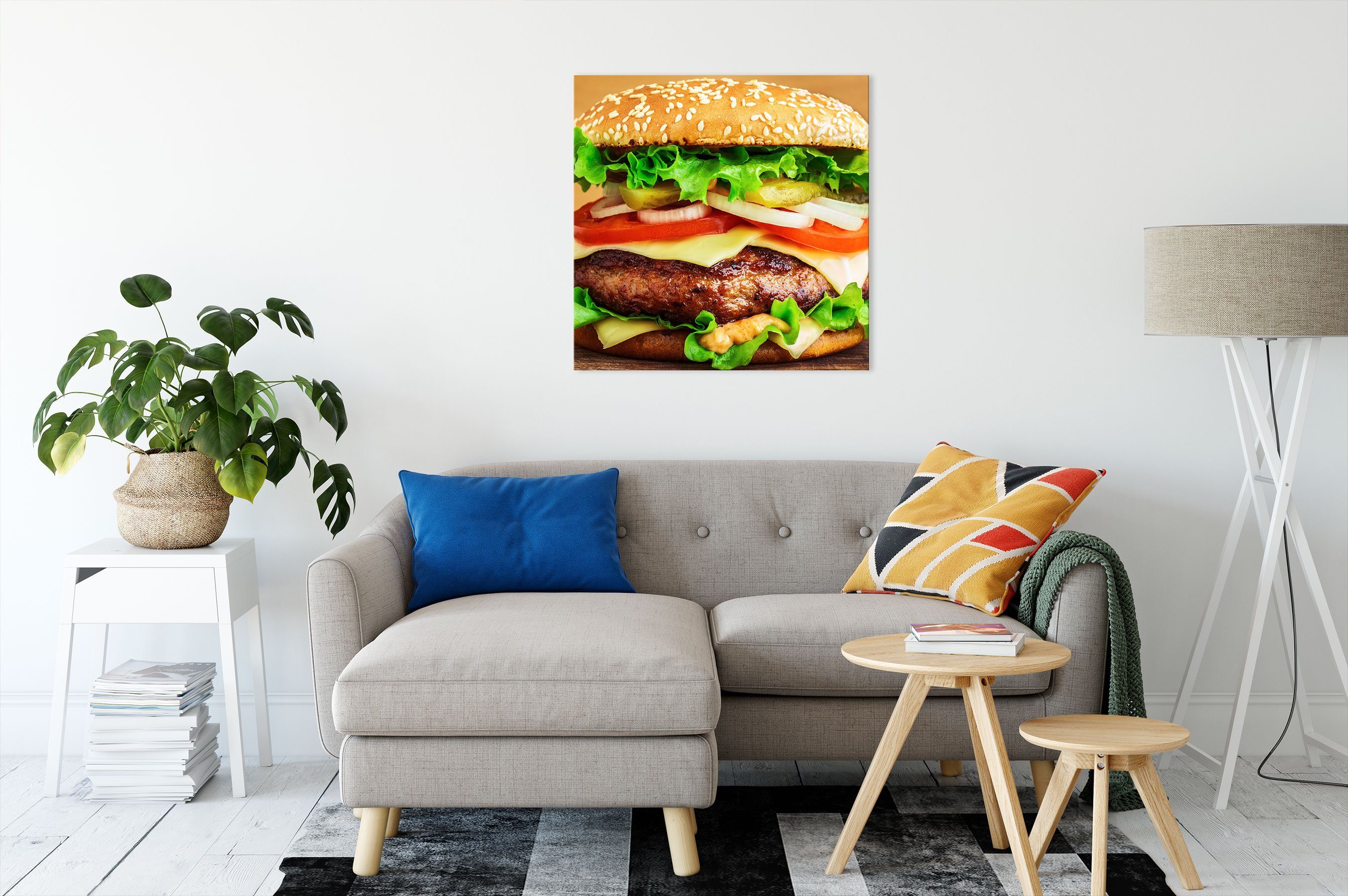bespannt, Leinwandbild Pixxprint Köstlicher Köstlicher fertig inkl. Zackenaufhänger Holztisch Burger Leinwandbild St), Burger auf auf (1 Holztisch,