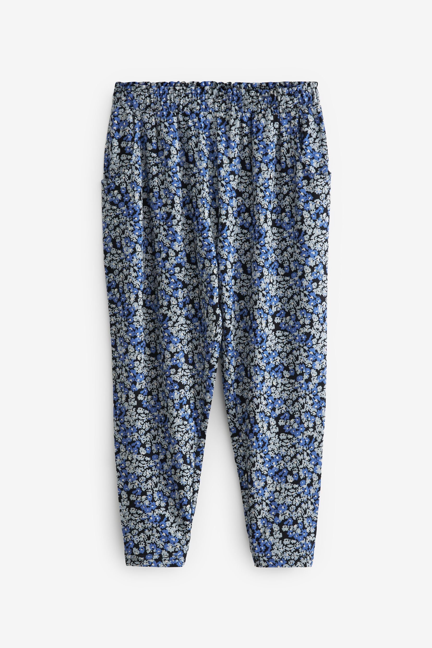 Next Schlupfhose Hose mit Tropenprint aus Stretch-Jersey (1-tlg) Blue Ditsy Floral Print
