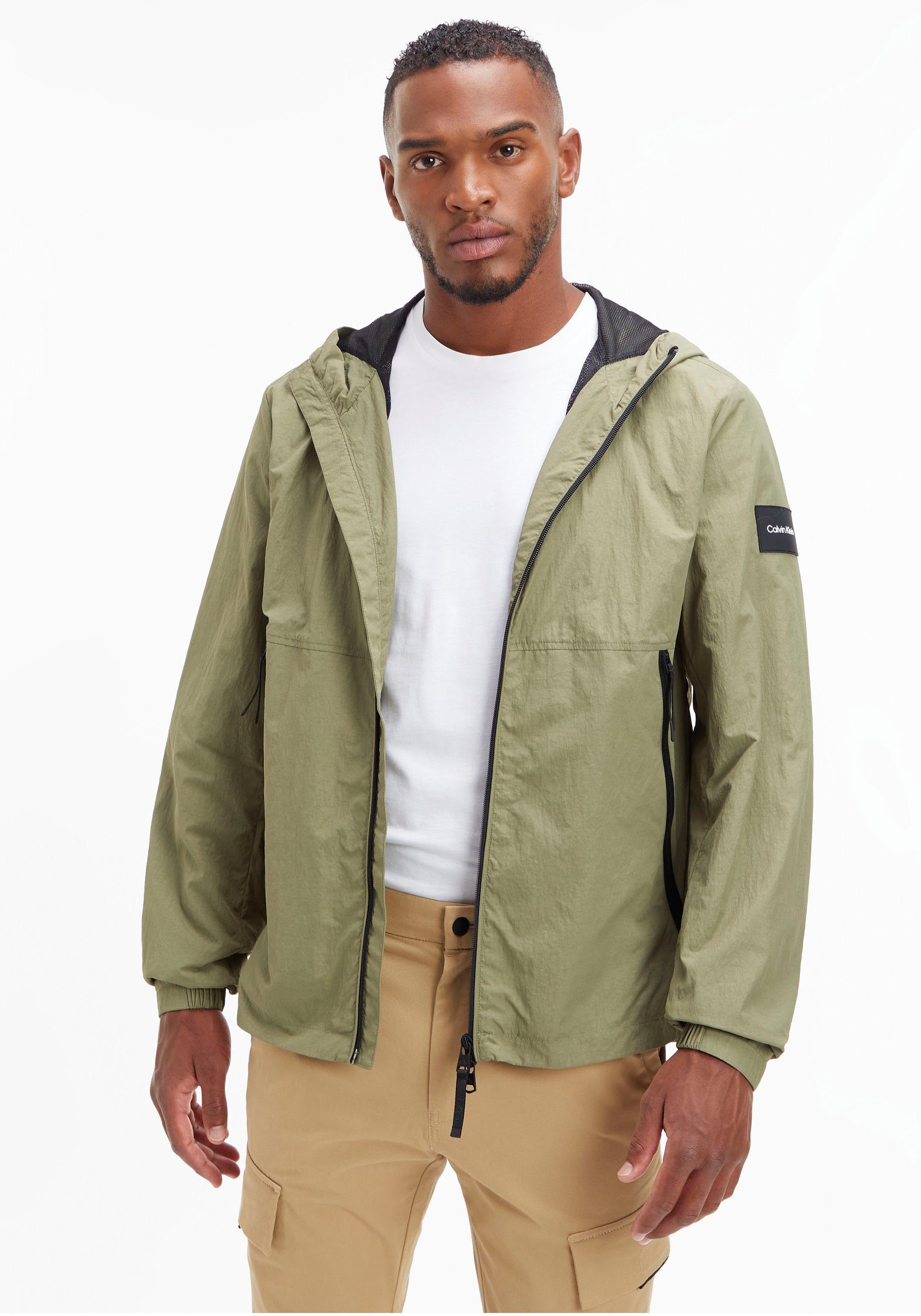 delta Klein mit Klein Calvin dem auf Blouson W. BLOUSON Ärmel Calvin Logo-Badge HOOD CRINKLE NYLON green