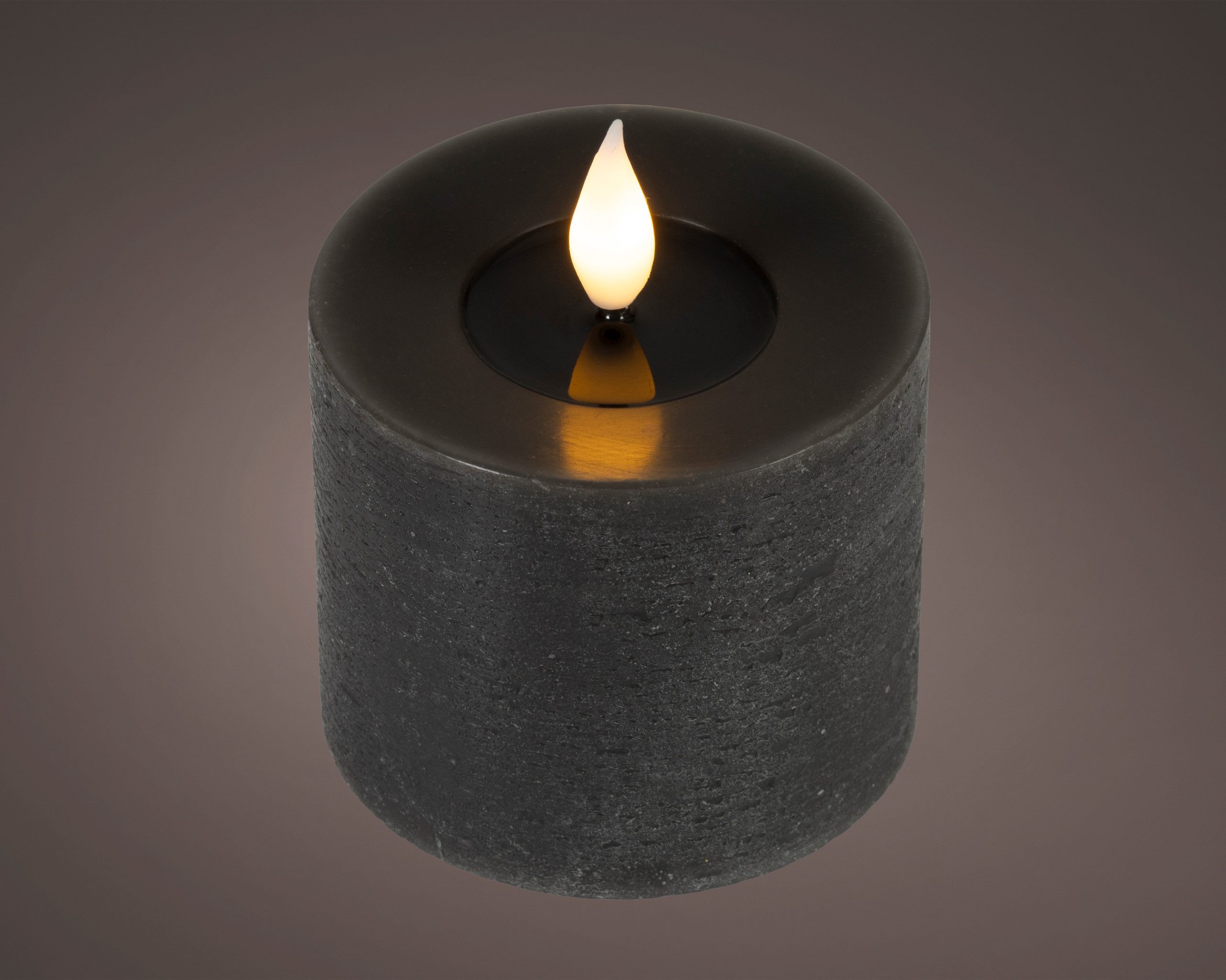 Lumineo LED-Kerze, Timer, warmweiß, LED Kerze 7,5x9,5cm mit Timer Wachs Flacker-Effekt Schwarz / Warmweiß