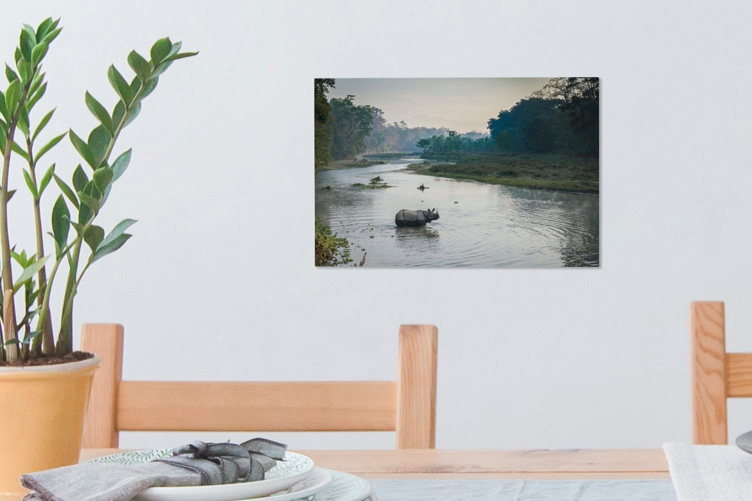 des (1 beim Nepal, cm Flusses 30x20 Leinwandbilder, Chitwan-Nationalpark, OneMillionCanvasses® Nashorn Wanddeko, Überqueren Aufhängefertig, im St), Leinwandbild Wandbild