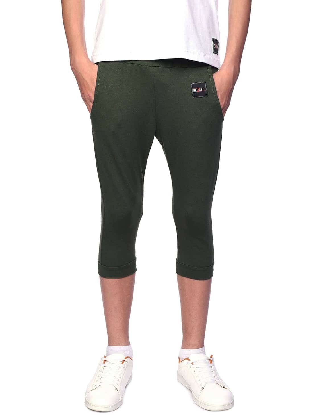 Shorts mit Stoff Strandshorts Kinder Jungen (1-tlg) elastischem BEZLIT Bund Capri Olivegrün