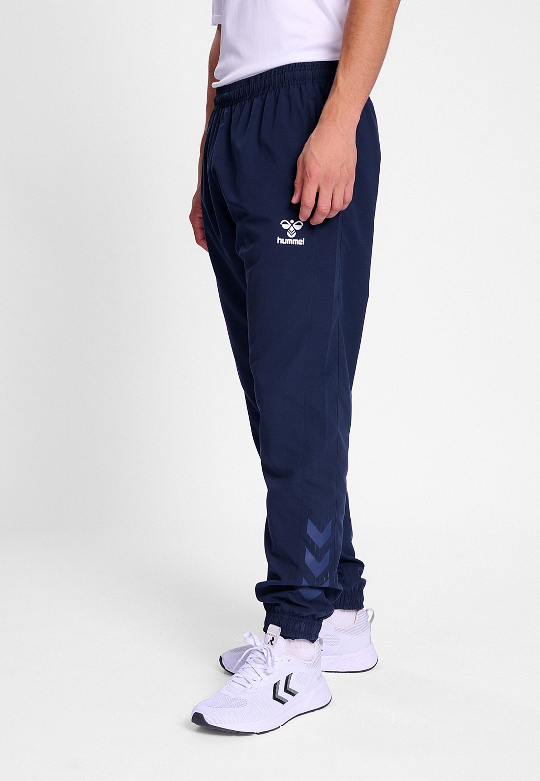 hummel Jogginghose Sporthose mit elastischem Bund hmlTRAVEL WOVEN PANTS günstig online kaufen