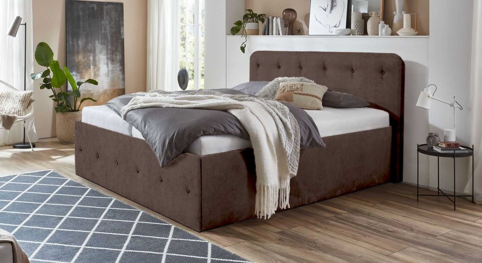 Halmon Schlafkomfort Betten Bett Luxi, Schöne Kopfteilpolsterung mit Knopfheftung und eine Höhe von 100 cm Braun