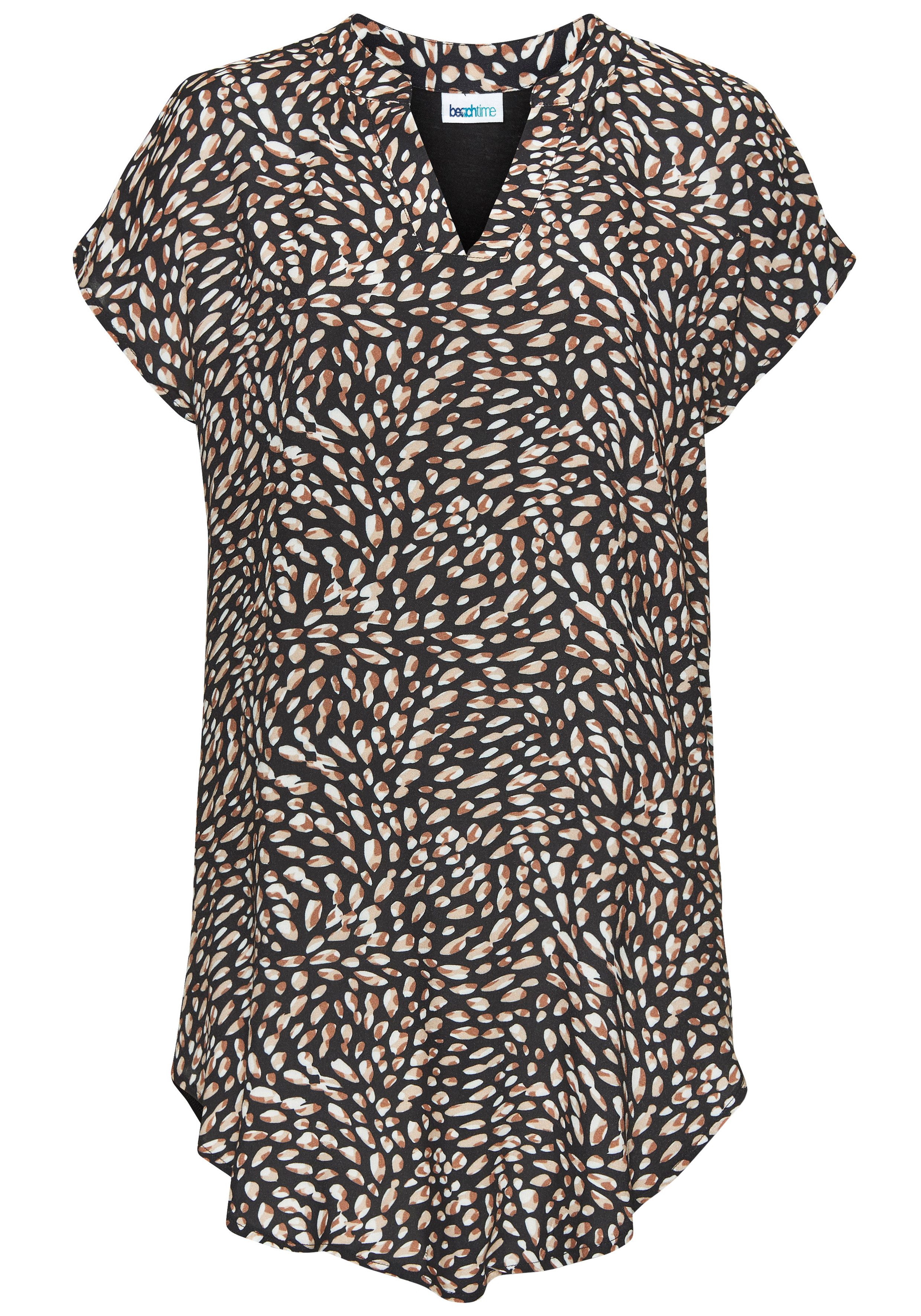 Beachtime Longshirt aus Materialmix. € 34,99