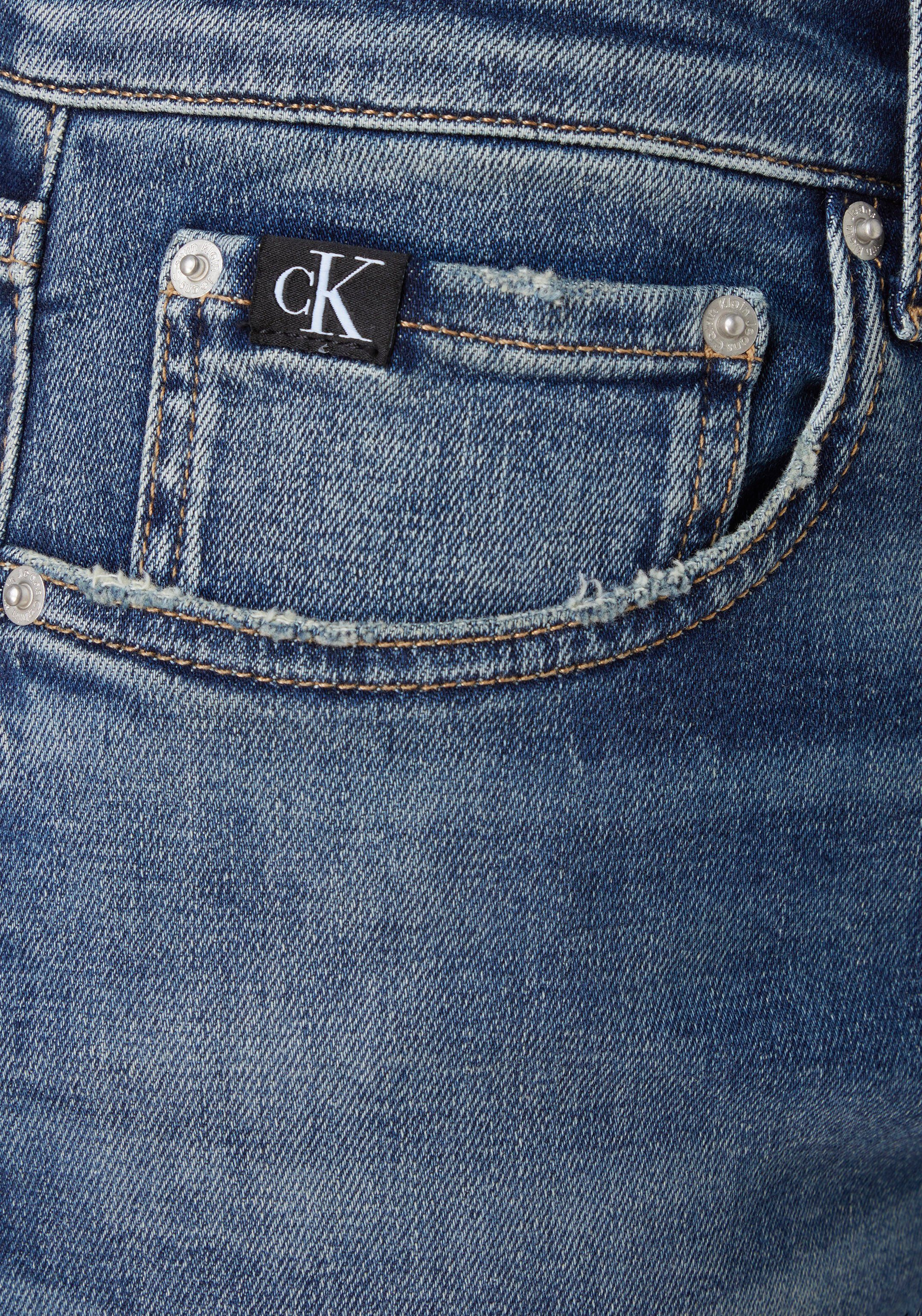 Tapered-fit-Jeans Klein Calvin Jeans mit Leder-Badge Klein Calvin SLIM TAPER