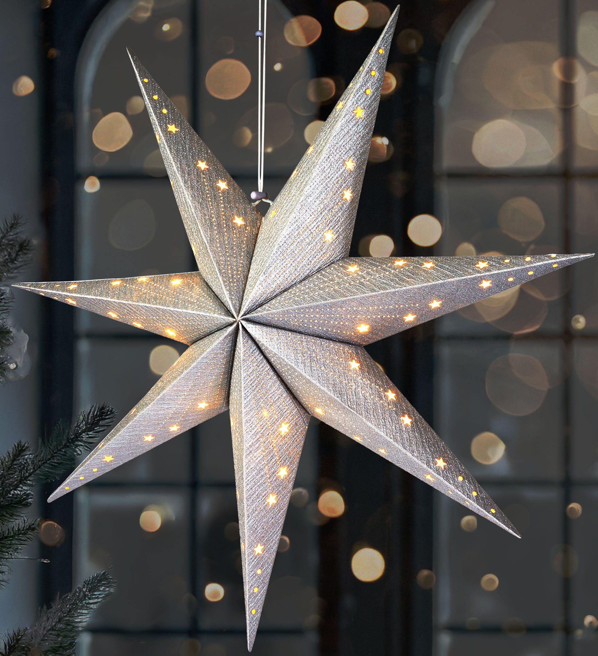 BRUBAKER LED Stern Weihnachtsstern zum Aufhängen - 60 cm Papierstern mit 7 Spitzen, Batteriebetrieben, Hängend und Beleuchtet, LED fest integriert, Warmweiß, 3D Adventsstern - Fenster Deko Leuchtstern Silber