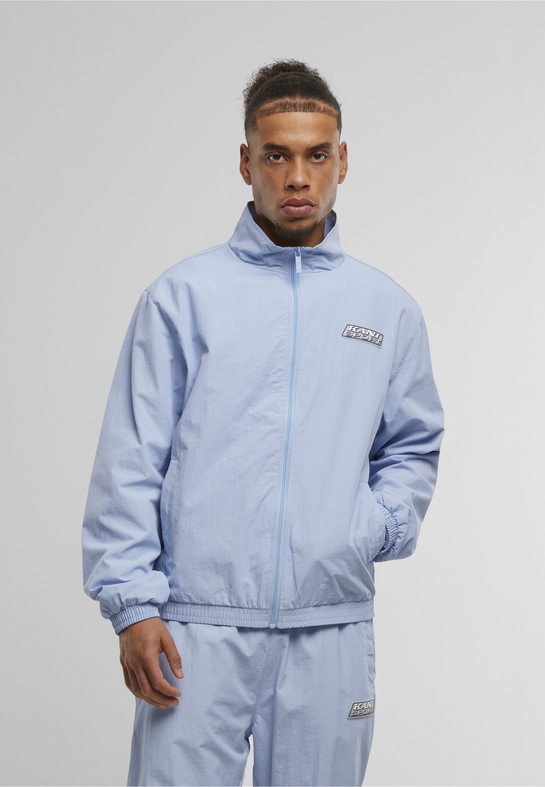 Karl Kani Trainingsjacke Karl Kani Karl Kani Sport Patch Essential Trackjacket (1-St)