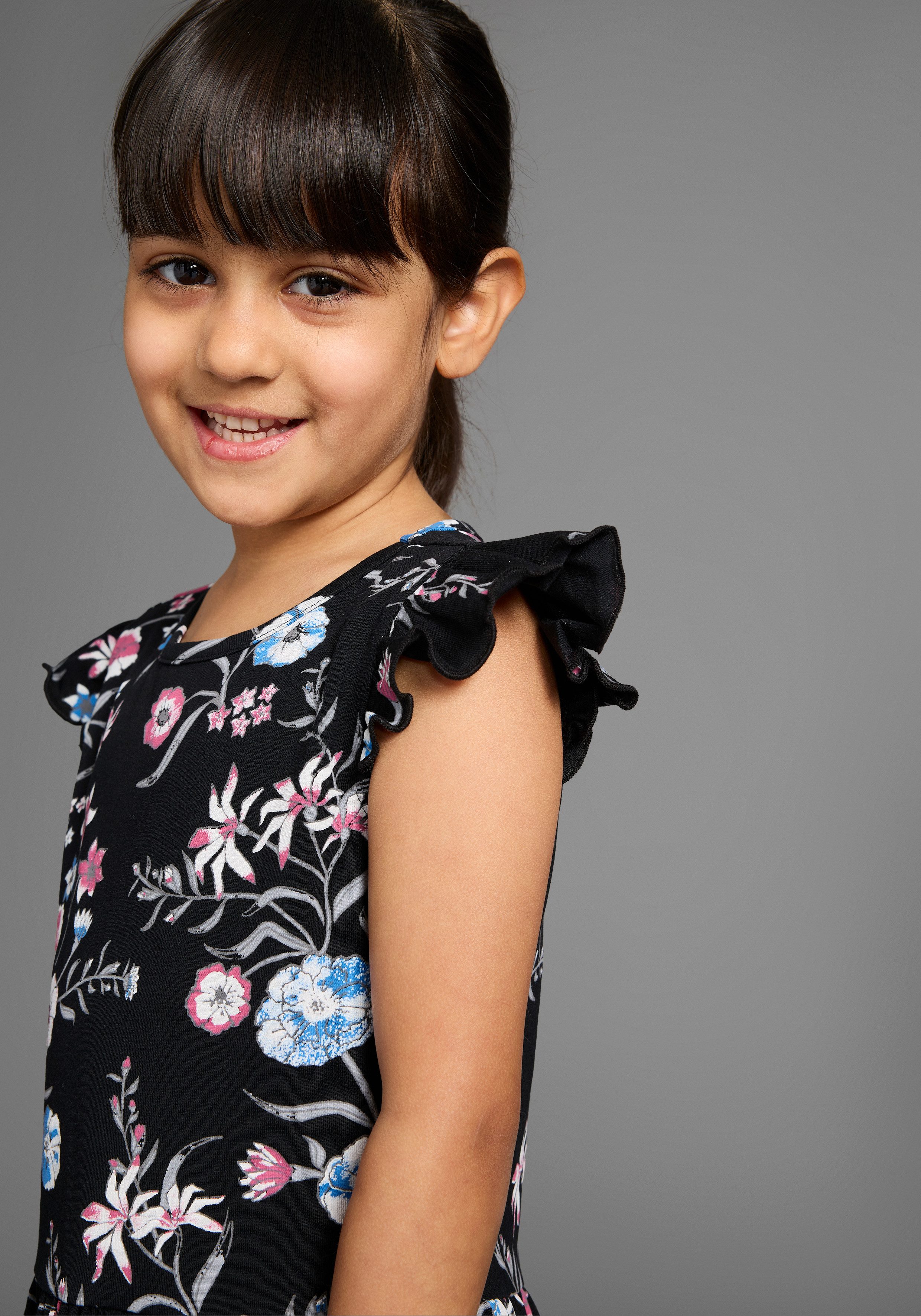 KIDSWORLD Jerseykleid Shirtkleid im trendigen Allover-Muster mit Flügelärmeln