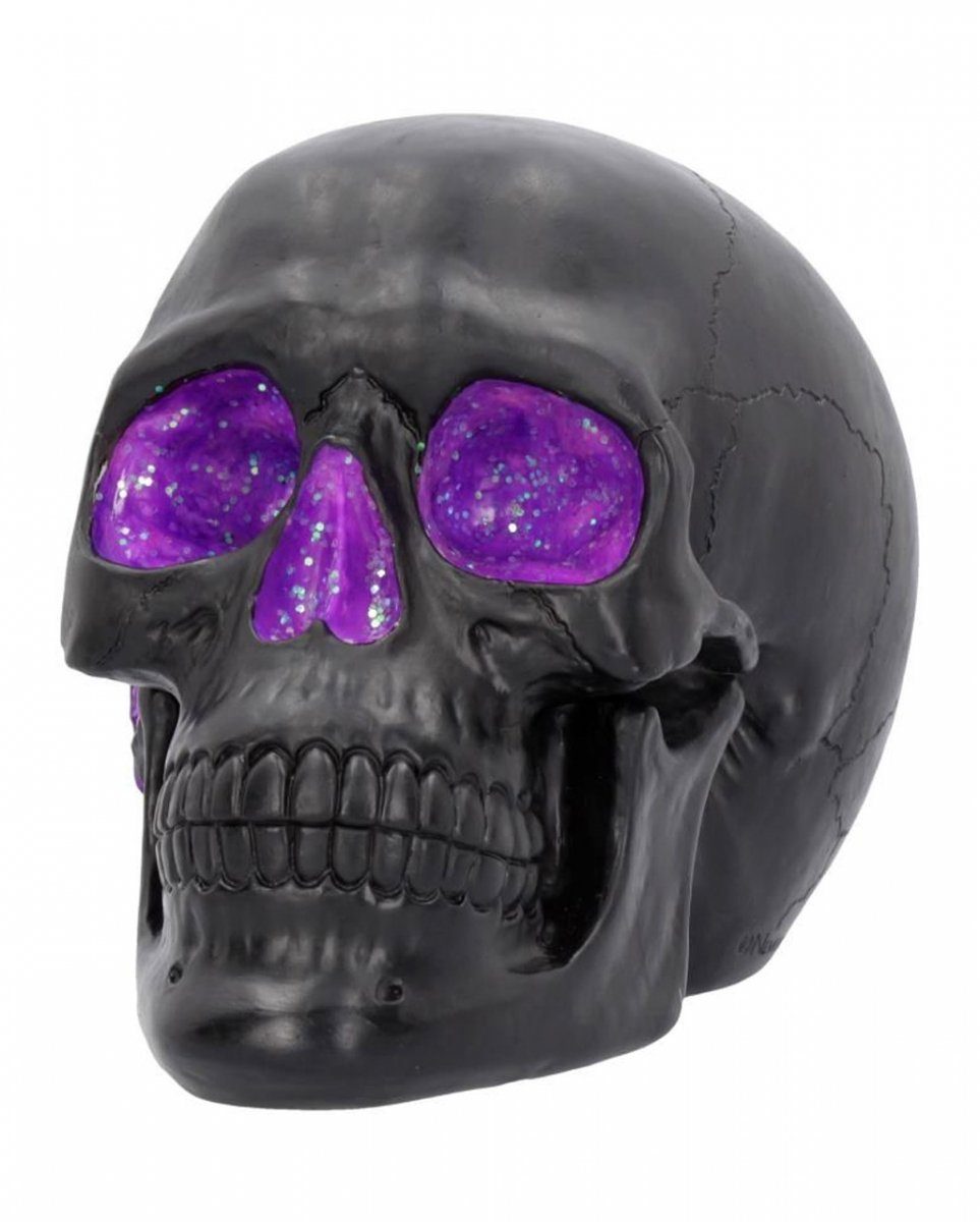 Horror-Shop Dekofigur Schwarzer Geode Totenkopf mit violettem Glitzereff günstig online kaufen