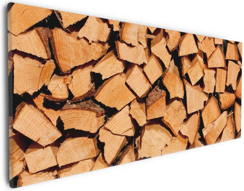 Wallario Leinwandbild, Holzstapel gehackt - Holzscheite für den Kamin, in verschiedenen Ausführungen
