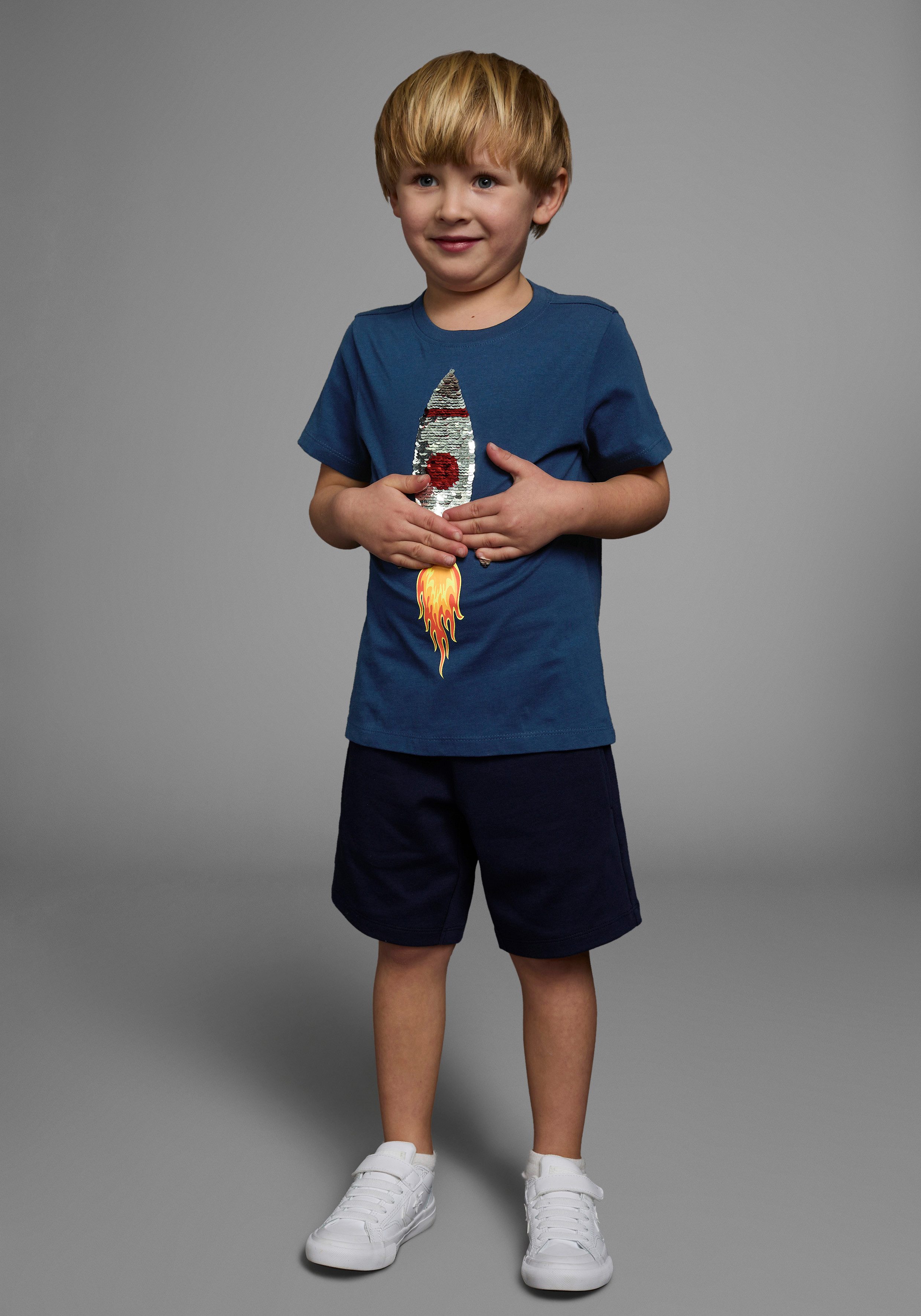 KIDSWORLD T-Shirt Mit Rakete aus Wendepailletten Kurzarm, Basic-Passform, bedruckt, Rundhalsausschnitt