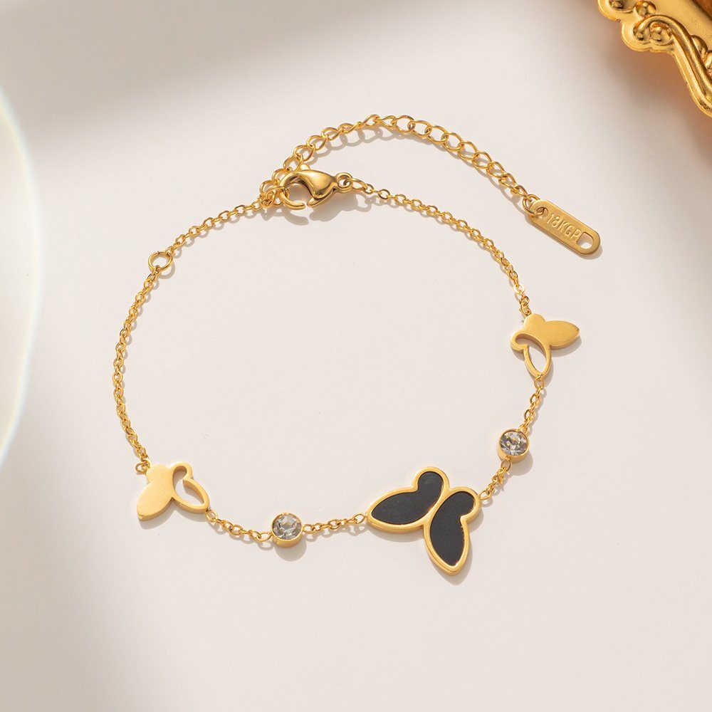 Goldarmband Armband Kettenarmband inkl. ENGELSINN Schmetterling Armreif Gold (1-tlg), Schwarz Geschenkbox