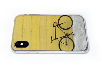 MuchoWow Handyhülle Ein Rennrad vor einem industriellen Hintergrund, Handyhülle Apple iPhone Xs, Smartphone-Bumper, Print, Handy