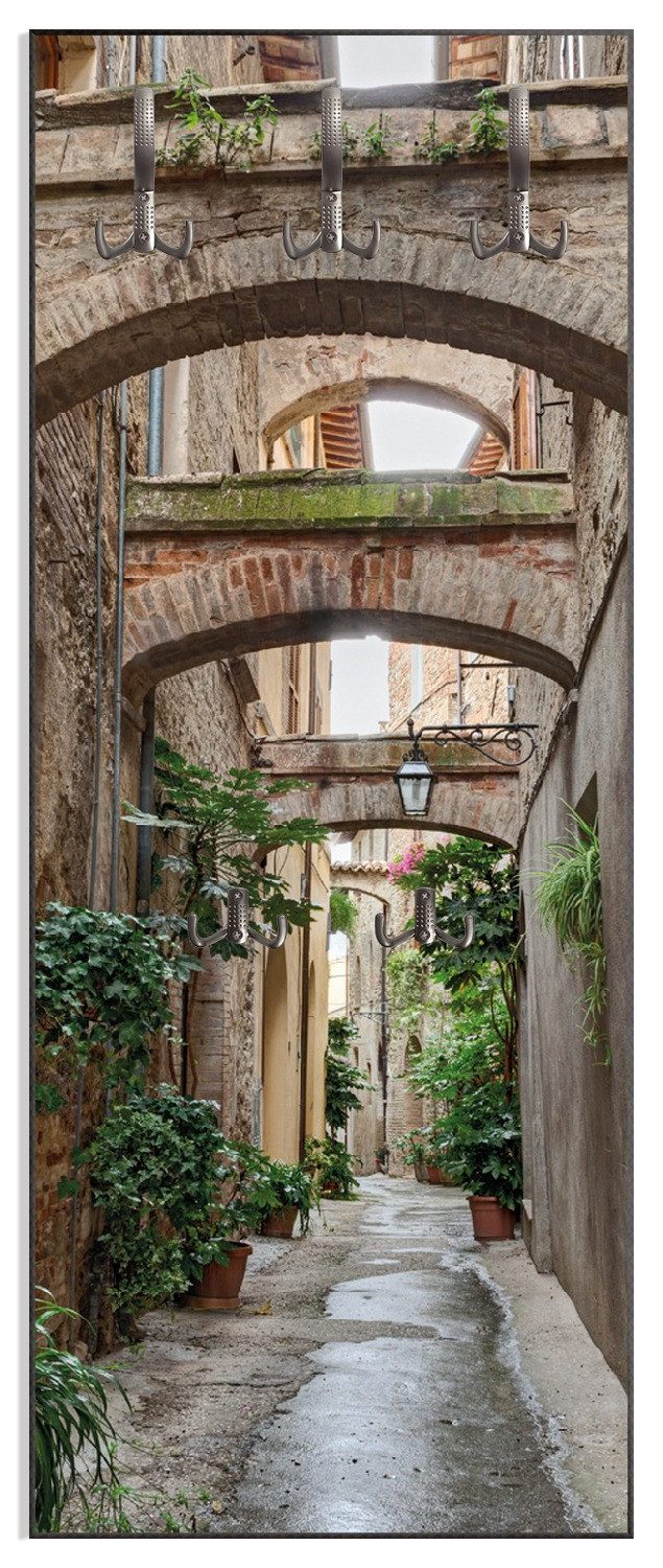 Wallario Garderobenpaneel Grüne italienische Gasse - mit alten Bögen (1-teilig, inkl. Haken und Befestigung), 50x125cmHolz