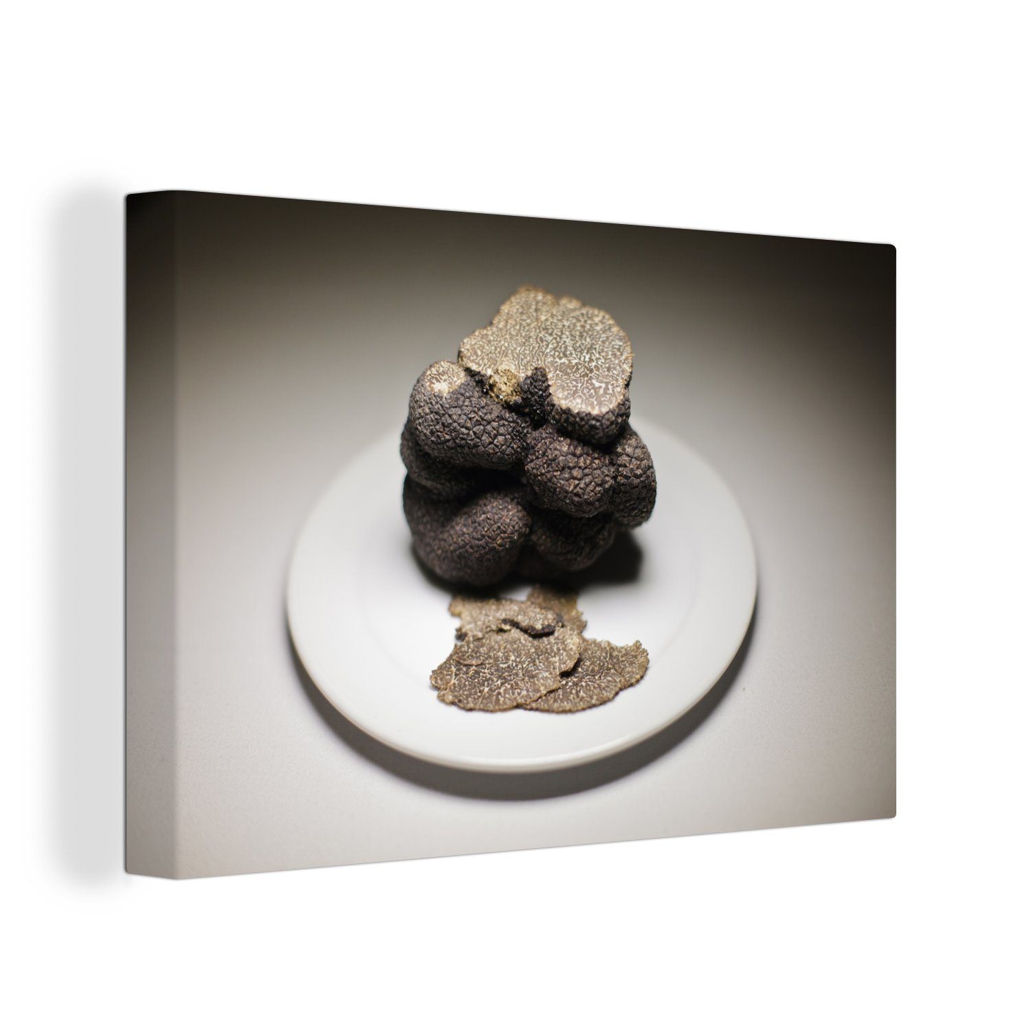 OneMillionCanvasses® Leinwandbild Ein schwarzer Trüffel aus Buenos Aires, Argentinien, (1 St), Wandbild Leinwandbilder, Aufhängefertig, Wanddeko, 30x20 cm