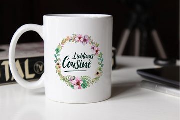 MoonWorks Tasse Kaffee-Tasse Geschenktasse Geschenk für Cousine Lieblingscousine Blumen Bordüre Blumenranke Blüten Familie MoonWorks®, Keramik
