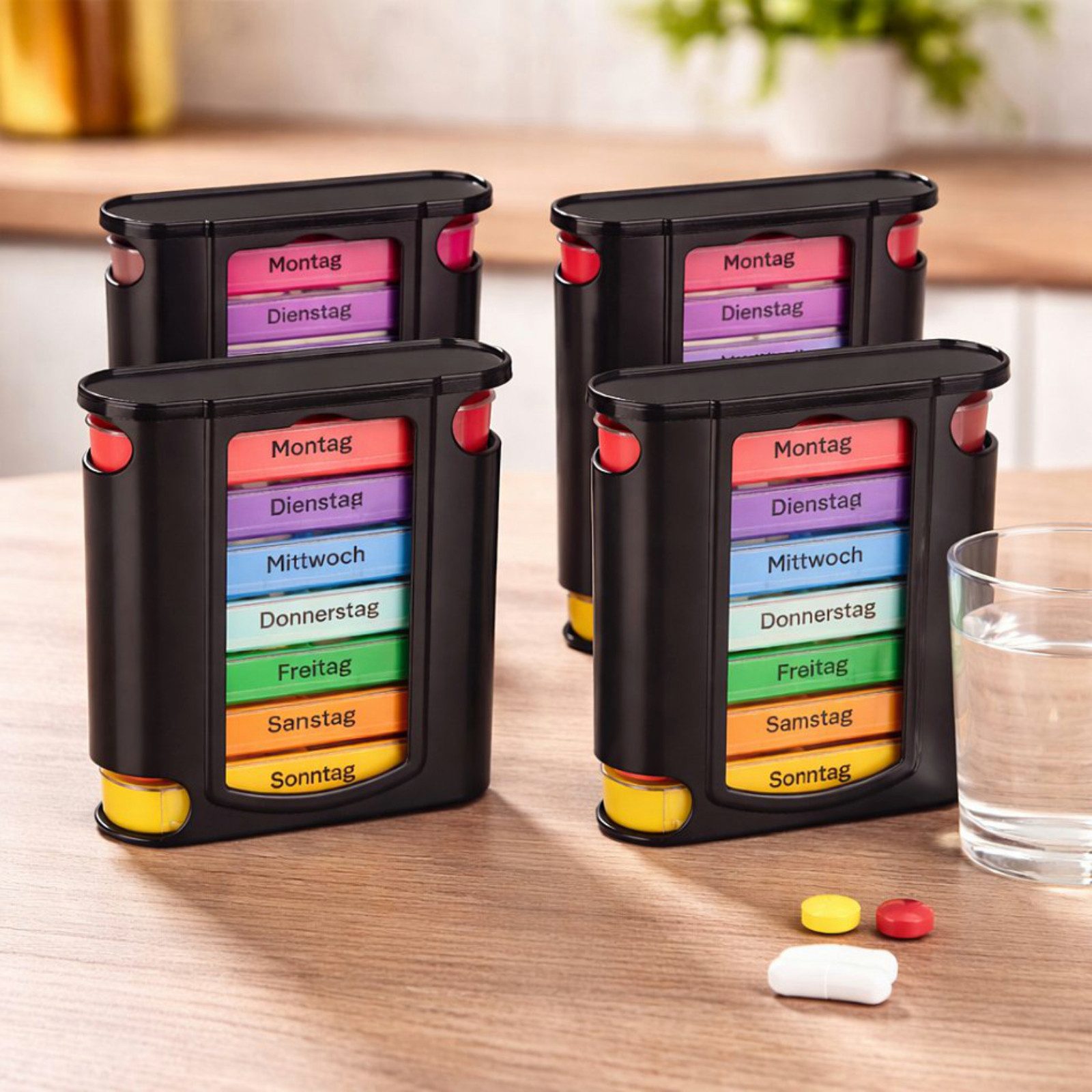 Haushalt International Im- und Export GmbH Pillendose 7 Tage Schwarz Behälter 4 Tlg. Set (Set, 4 St., Packung), je 7 Wochentage, Reiseformat, Kunststoff, Monatseinteilung