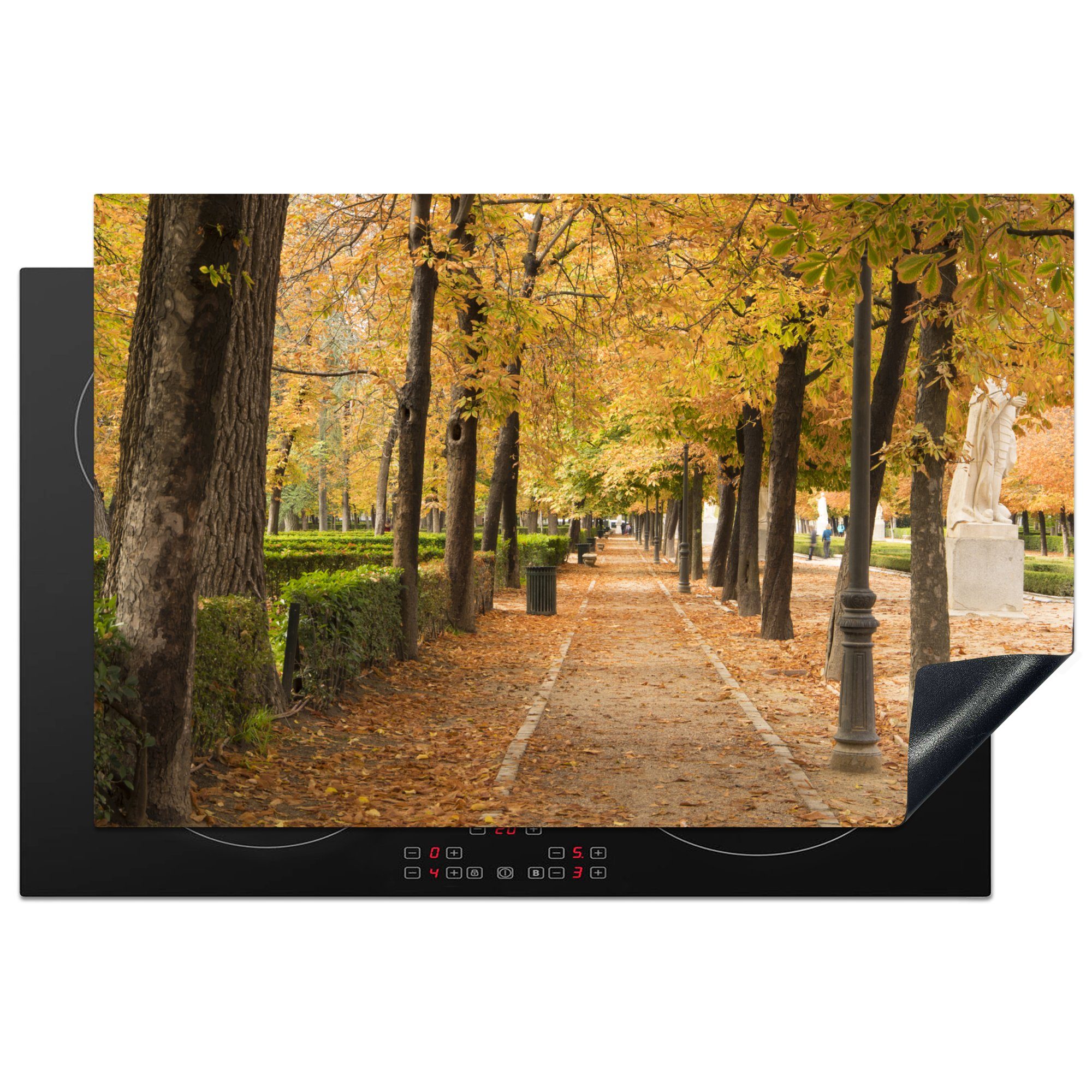 MuchoWow Herdblende-/Abdeckplatte Herbstlaub im Buen Retiro Park in Madrid, Vinyl, (1 tlg), 81x52 cm, Induktionskochfeld Schutz für die küche, Ceranfeldabdeckung