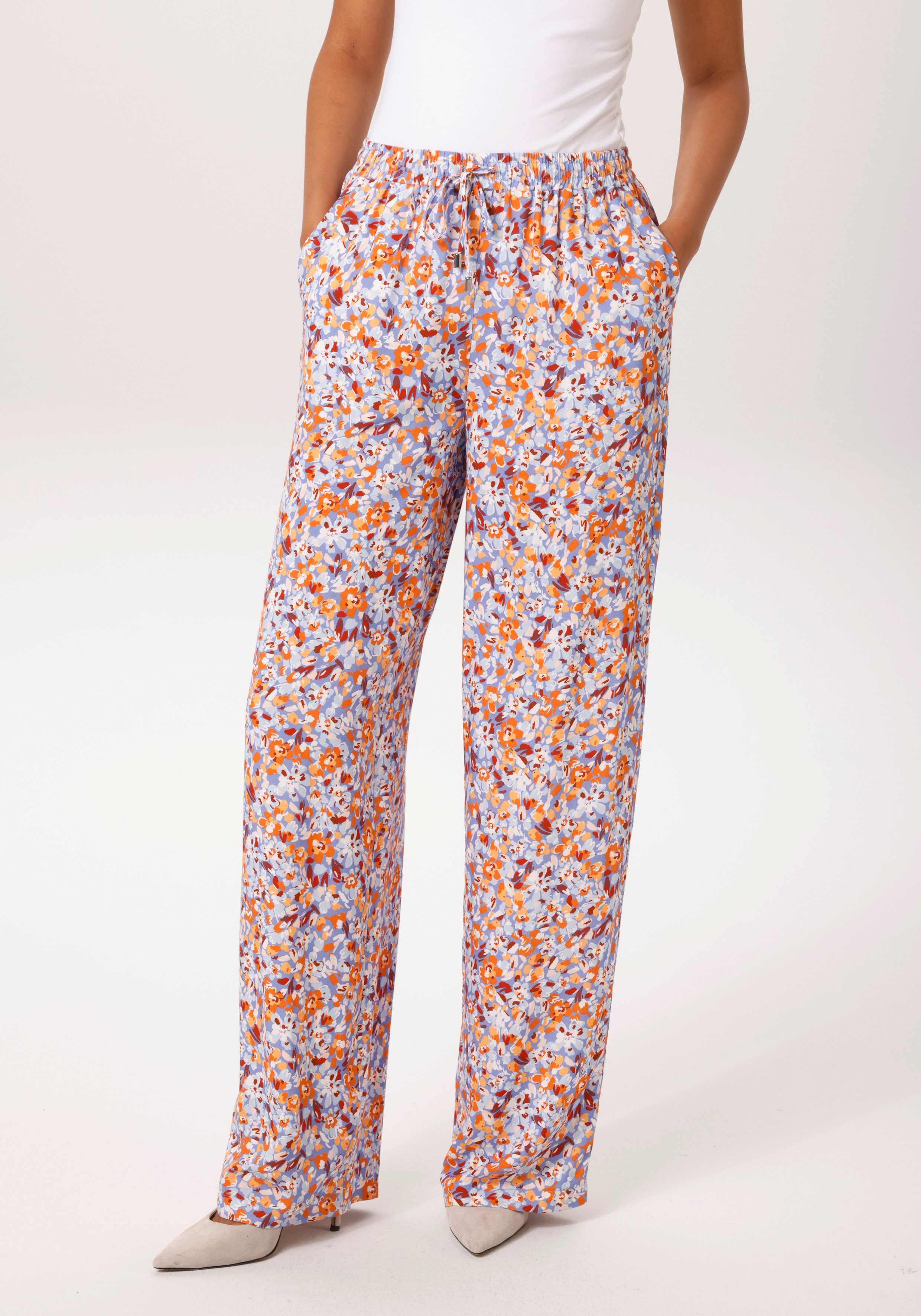 Aniston CASUAL Schlupfhose mit farbharmonischen, grafischen Blumen bedruckt günstig online kaufen