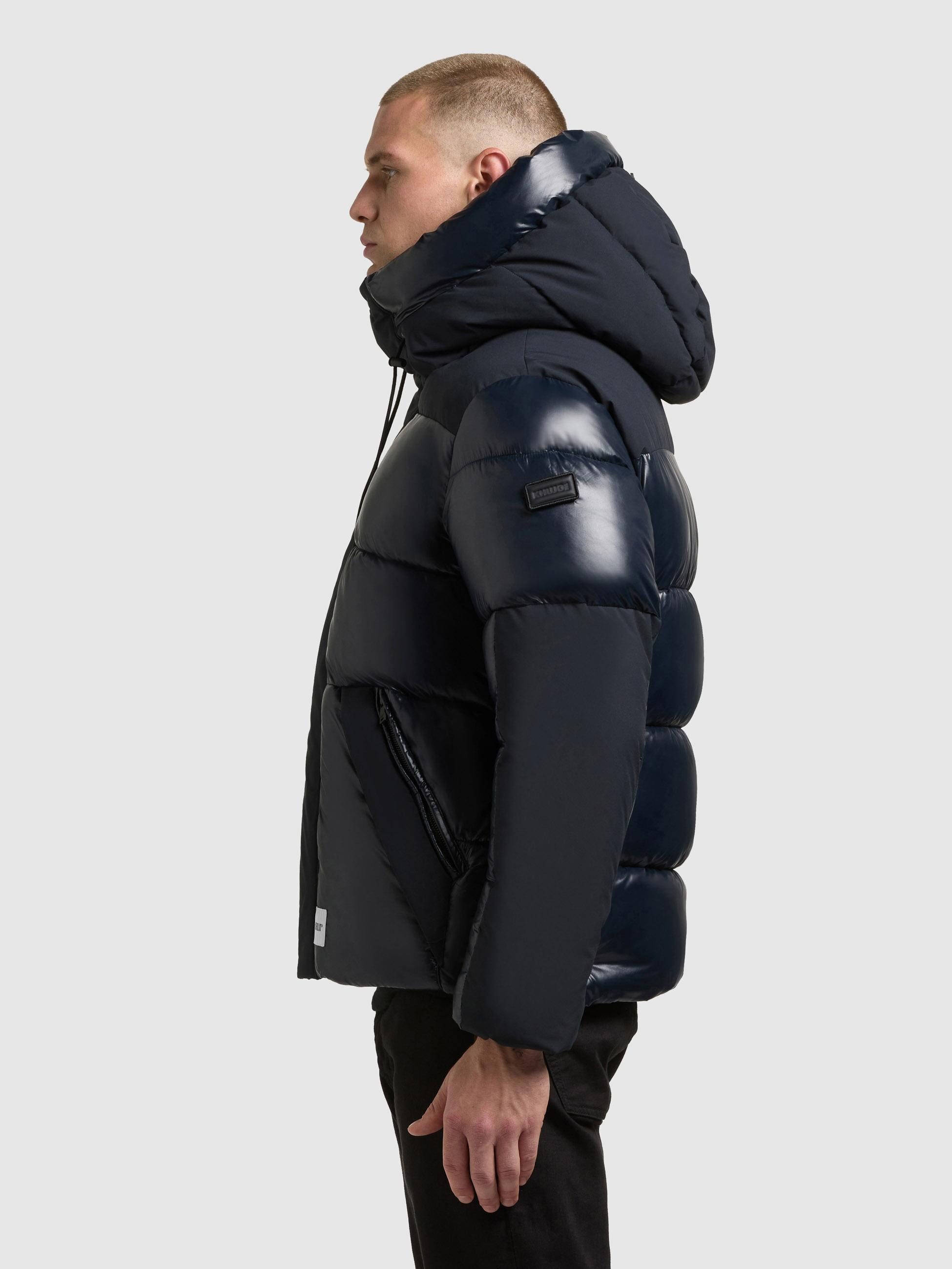khujo Steppjacke Alst Schimmernde Herren Jacke mit innenliegenden Rucksack- günstig online kaufen