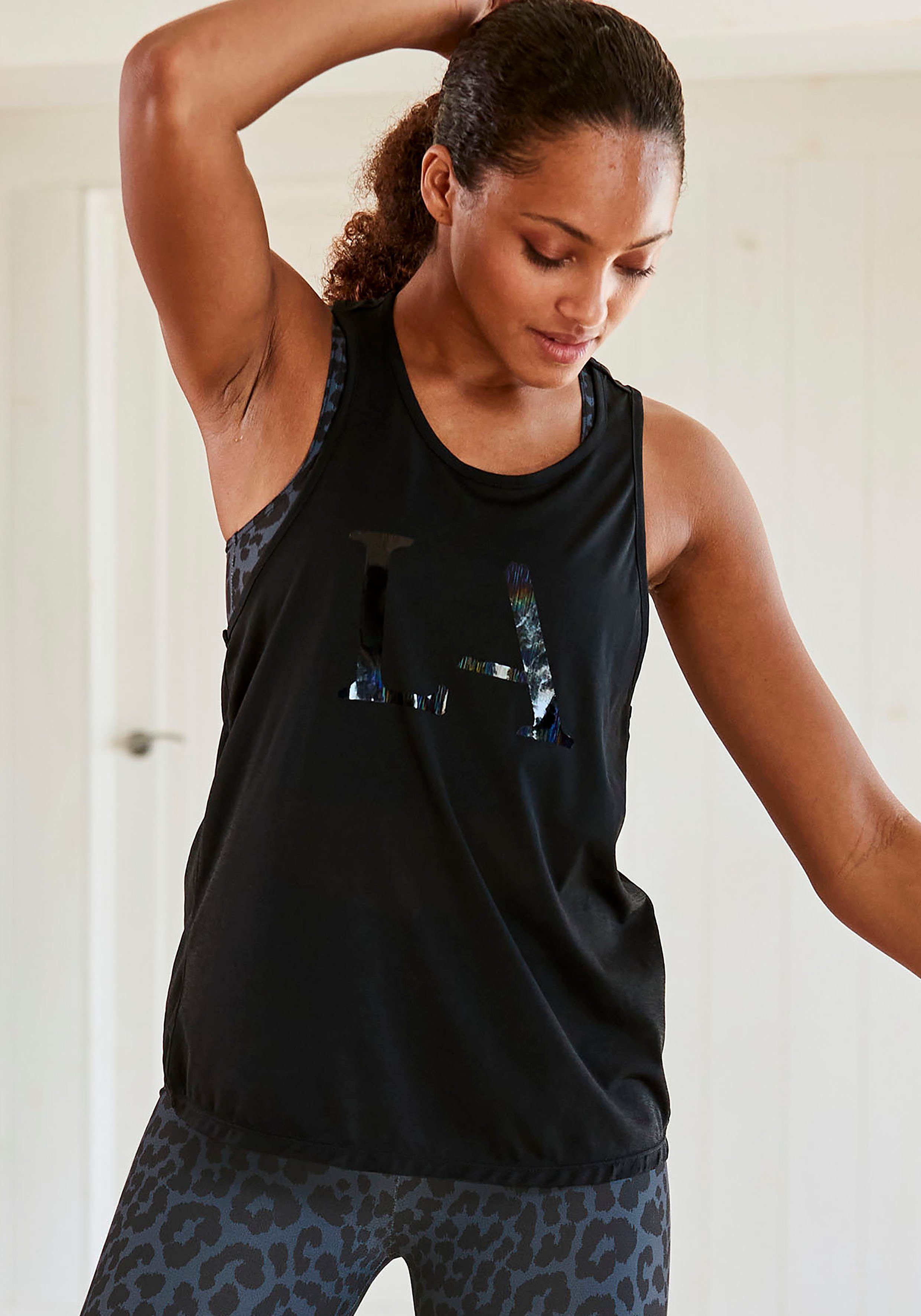 LASCANA ACTIVE Funktionsshirt mit Cut out im Rücken. € 29,99