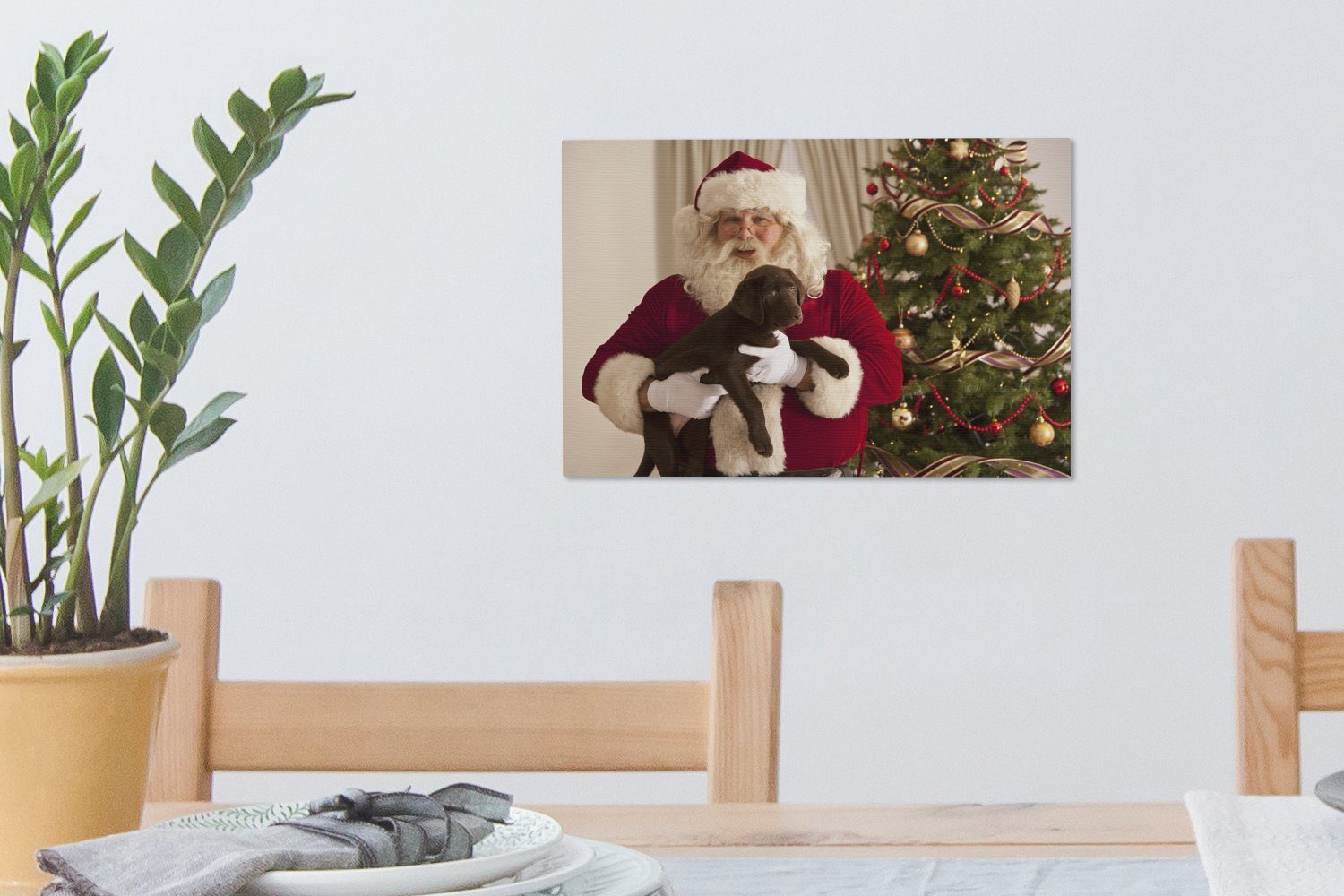 braunen (1 Wanddeko, Leinwandbild Der St), Weihnachtsmann mit in Hund Aufhängefertig, Leinwandbilder, Wandbild den Händen, OneMillionCanvasses® einem 30x20 cm