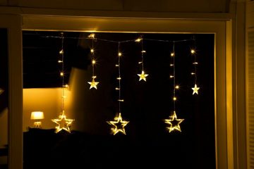 Meinposten LED-Lichterkette Sternenvorhang Sternvorhang LED warmweiß Lichtervorhang 100x80 cm, Die insgesamt 63 LEDs leuchten in warmweiß