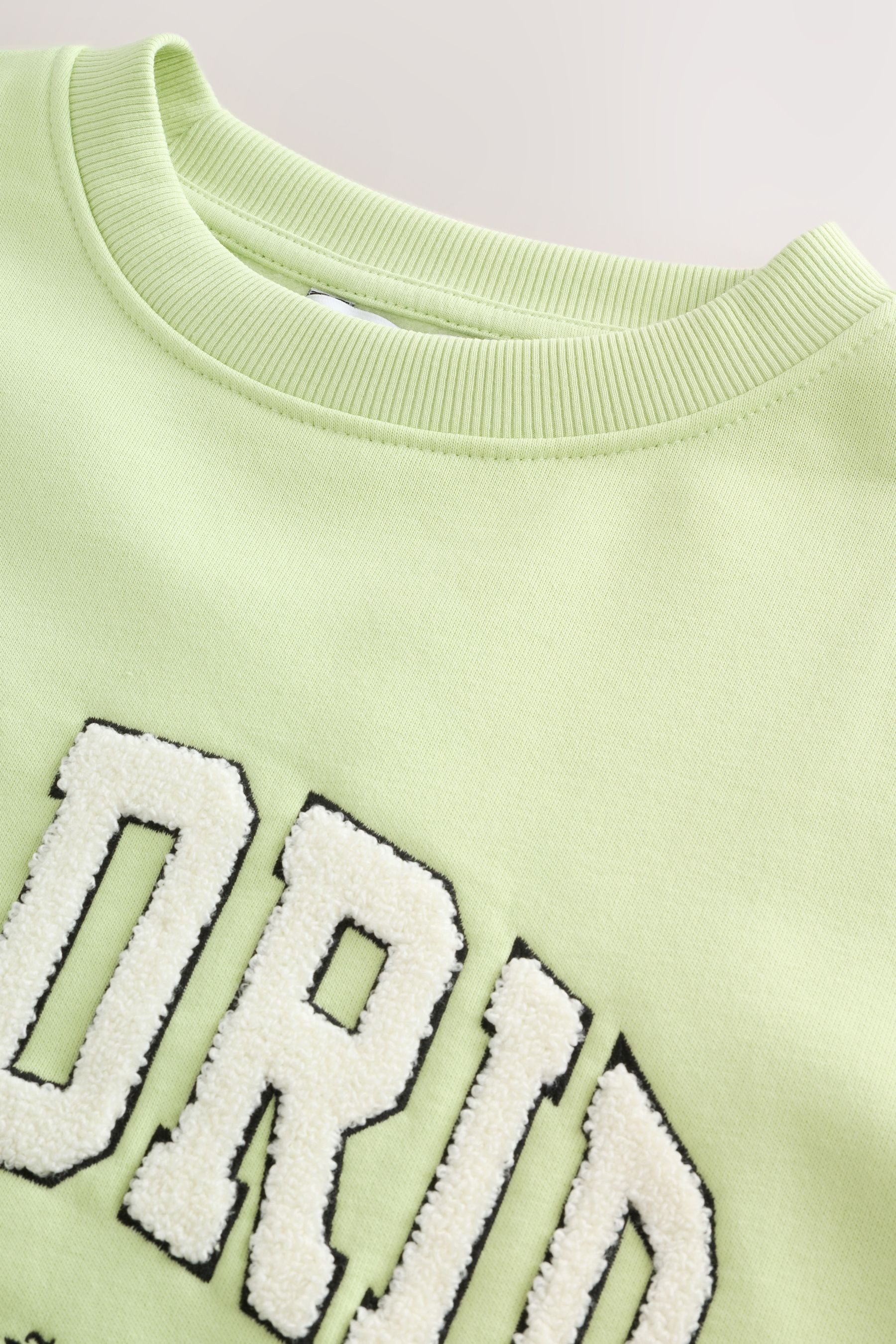 Next Sweater Relaxed Fit Boucle-Sweatshirt mit Grafikprint (1-tlg) günstig online kaufen