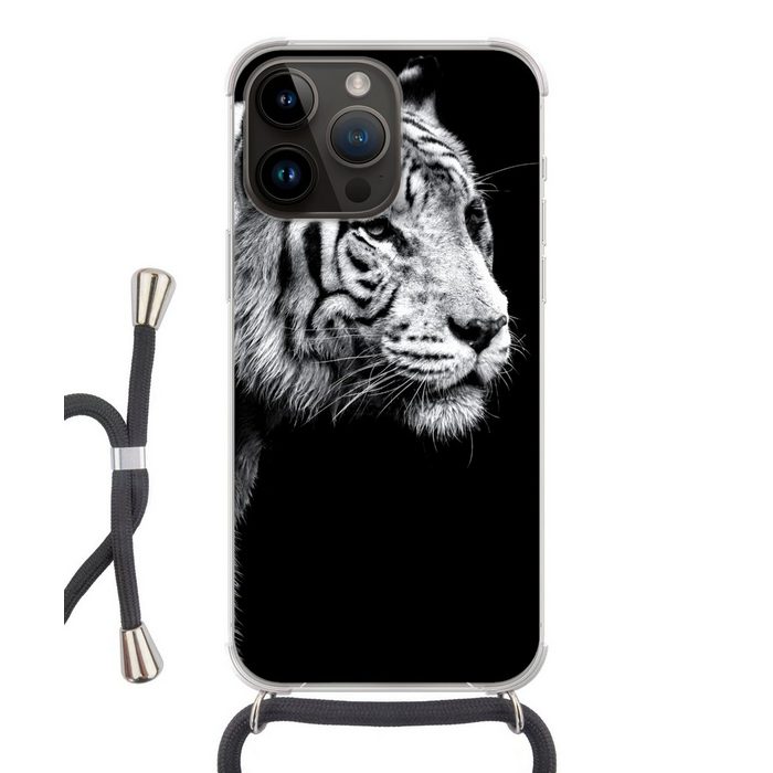 MuchoWow Handyhülle Studioaufnahme eines weißen Tigers auf schwarzem Hintergrund Handyhülle Telefonhülle Apple iPhone 14 Pro