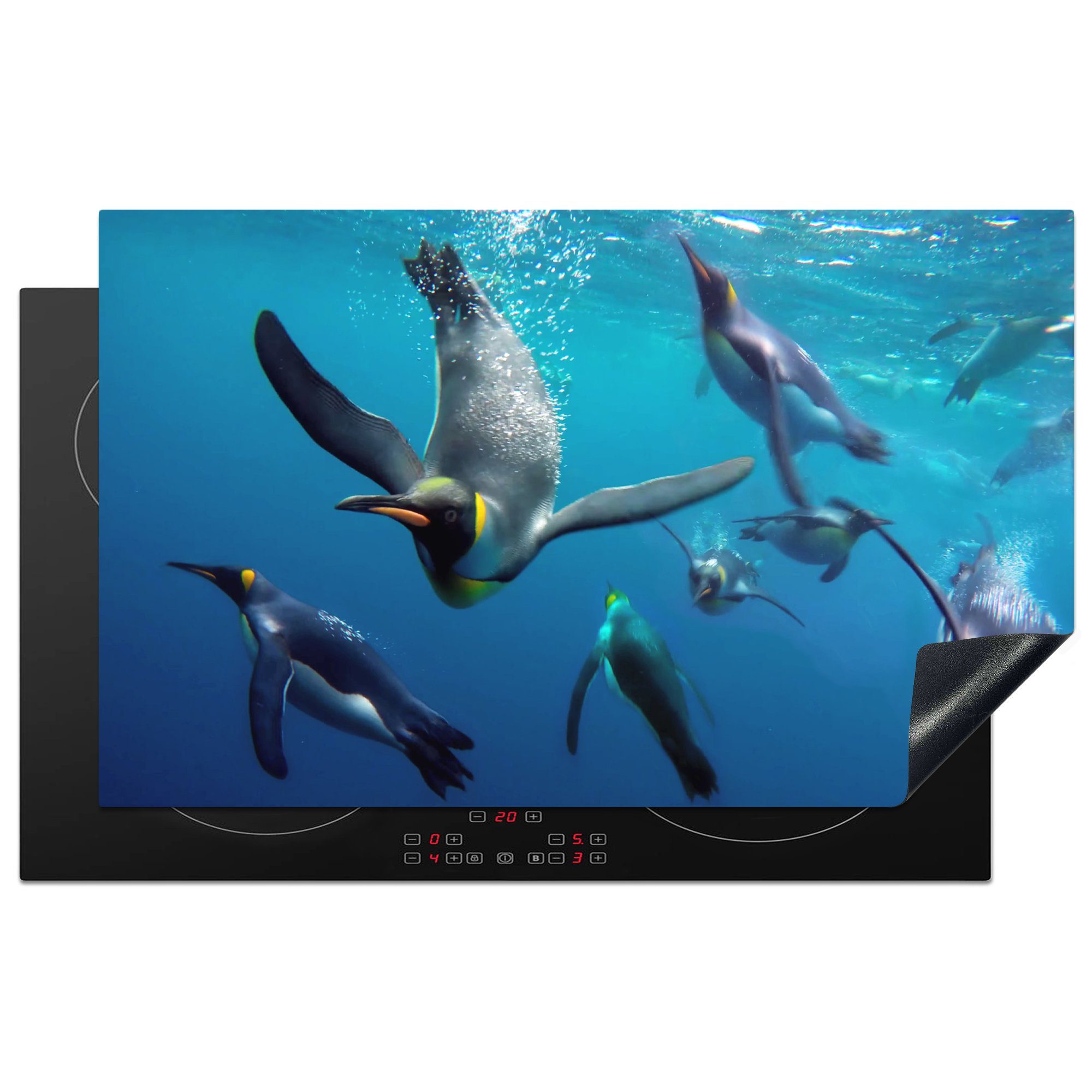 MuchoWow Herdblende-/Abdeckplatte Pinguine unter Wasser, 83x51 cm, Arbeitsplatte (1 küche Vinyl, tlg), für Ceranfeldabdeckung