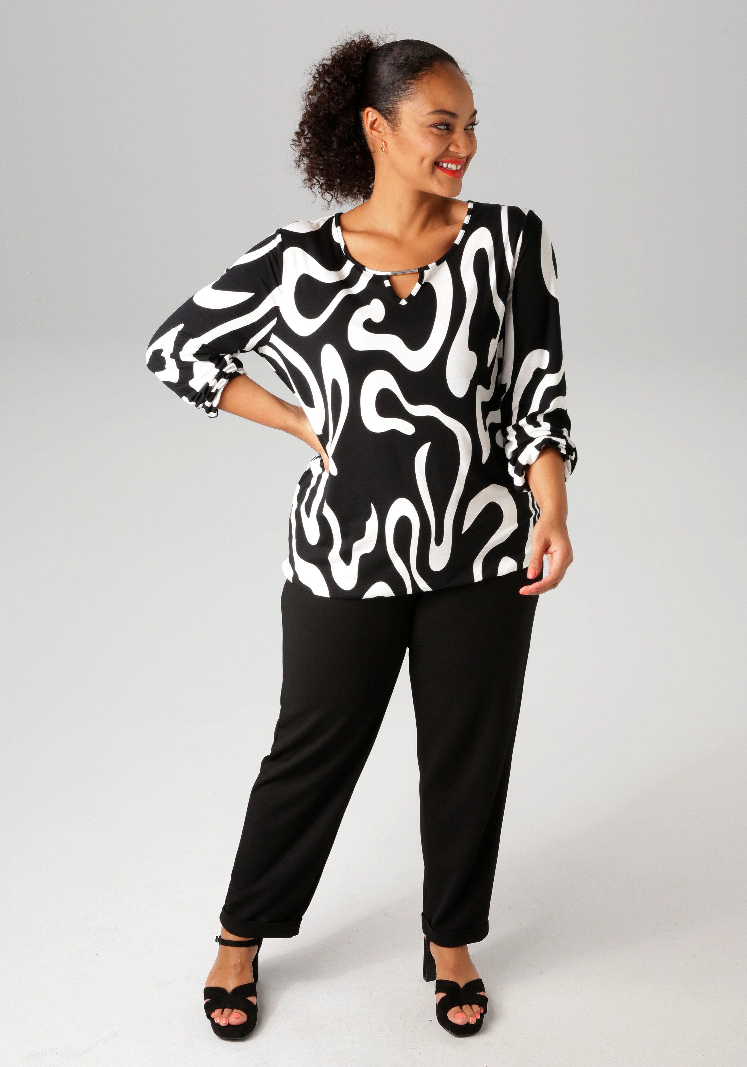 Aniston PLUS Langarmshirt mit großflächigem, grafischen Druck günstig online kaufen