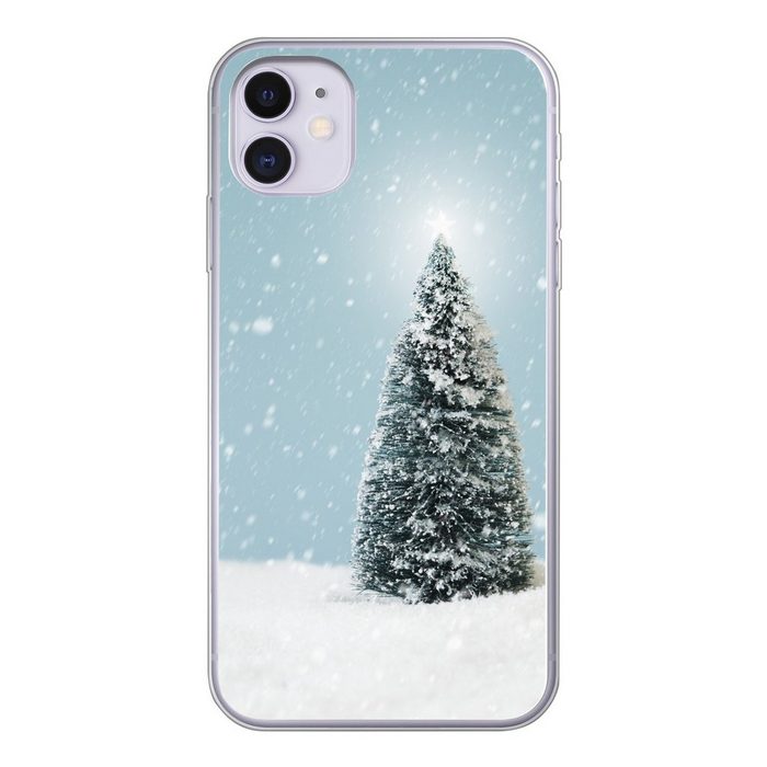 MuchoWow Handyhülle Ein Weihnachtsbaum in einer verschneiten Landschaft und einem blauen Handyhülle Apple iPhone 11 Smartphone-Bumper Print Handy