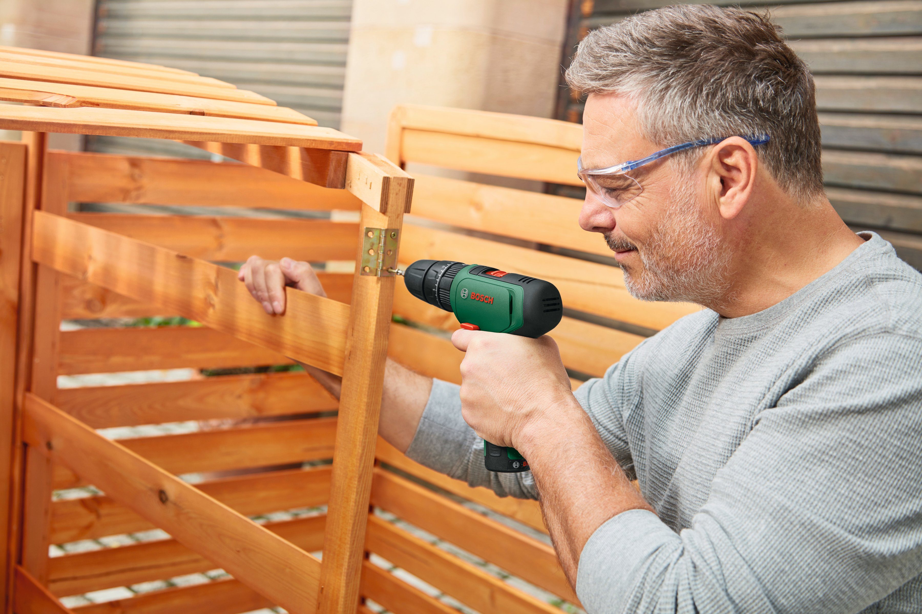 1200, U/min, Akku max. Akku-Schlagbohrschrauber mit & 1500 Ladegerät EasyImpact Bosch Home und Garden