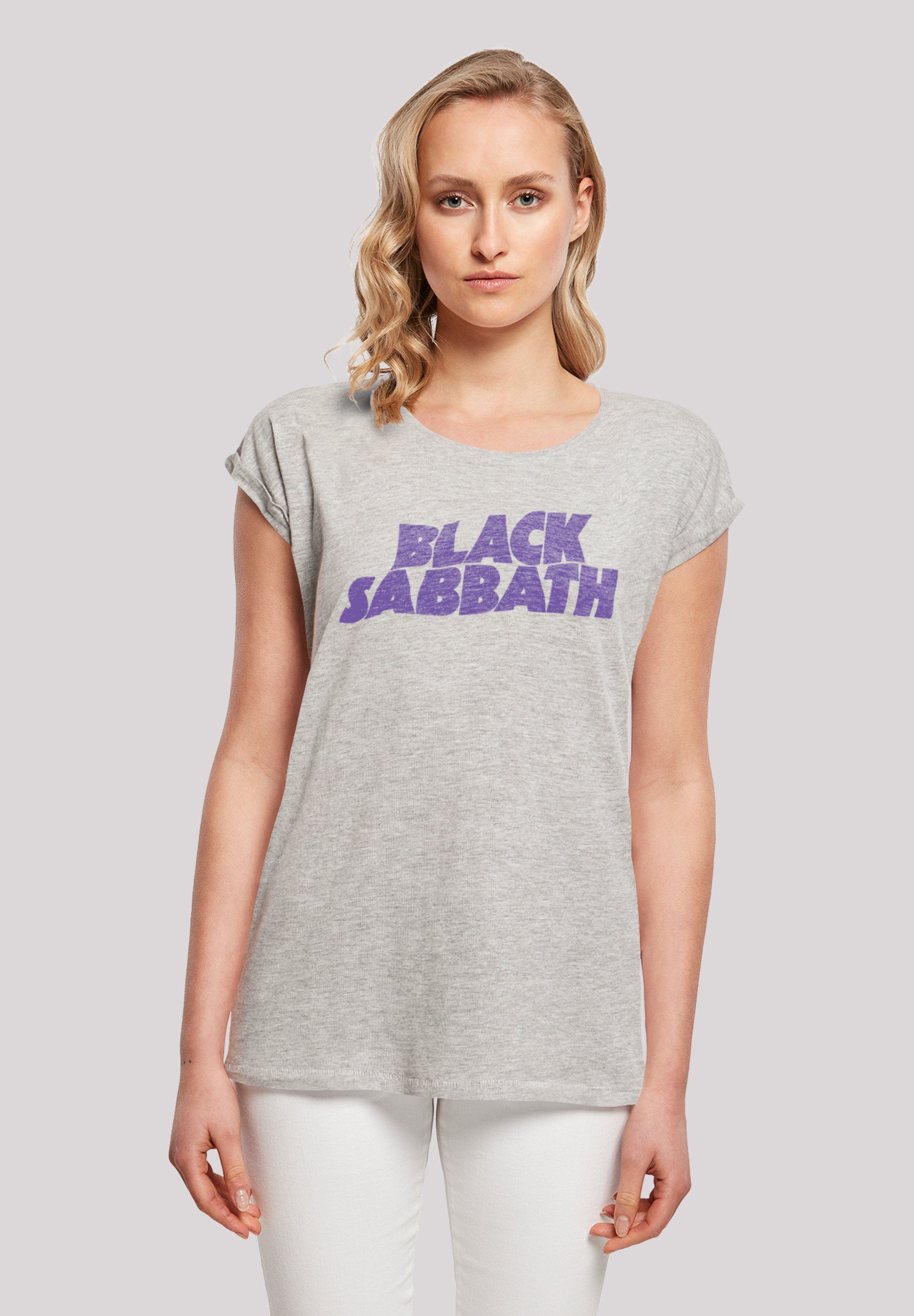 F4NT4STIC T-Shirt Black Sabbath Heavy Metal Band Wavy Logo Black Print, Das  Model ist 170 cm groß und trägt Größe M