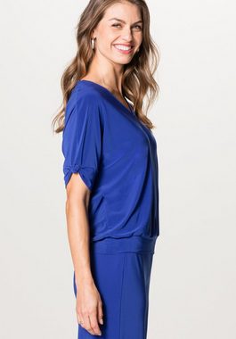 bianca Kurzarmshirt SIA in angesagter Trendfarbe mit Knoten-Detail am Arm