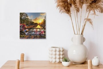 OneMillionCanvasses® Leinwandbild Amsterdam - Blumen - Brücke - Fahrrad - Sonnenuntergang, (1 St), Leinwand Bilder für Wohnzimmer Schlafzimmer