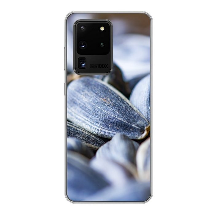 MuchoWow Handyhülle Nahaufnahme der schwarzen Außenseite von Sonnenblumenkernen Phone Case Handyhülle Samsung Galaxy S20 Ultra Silikon Schutzhülle