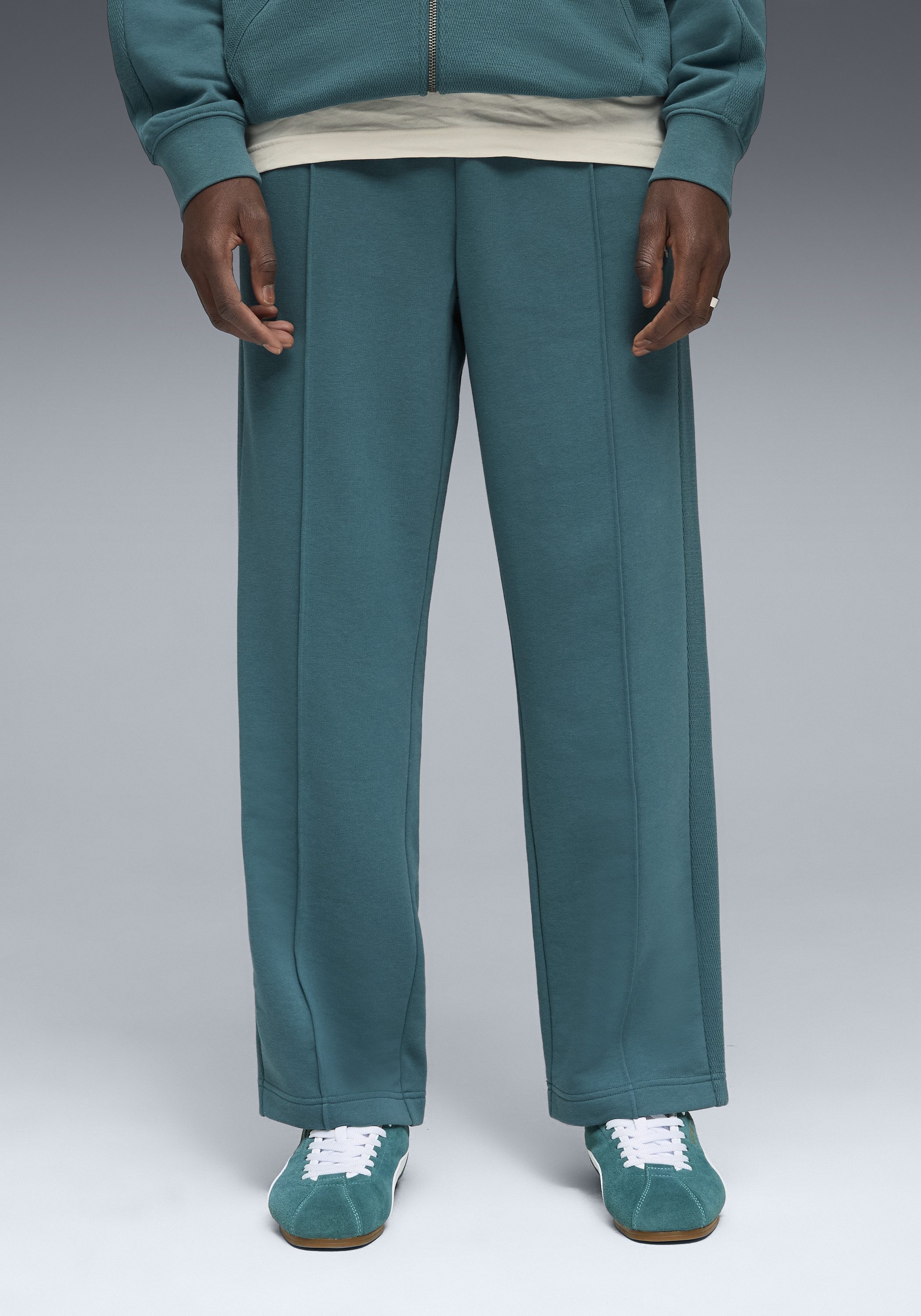 PUMA Trainingshose CLASS RELAXED PINNACLE TRACK PANTS TR mit Eingrifftaschen, sportlicher Stil