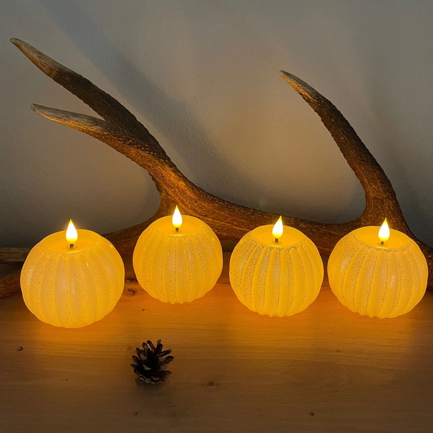Online-Fuchs LED-Kerze 4er Set LED KUGELKERZEN aus Wachs mit Glitzer, Fernbedienung, (6-Stunden-Timer, 3D-Twist-Design-Struktur), in den Farben Creme, Weiß, Rot und Rosa