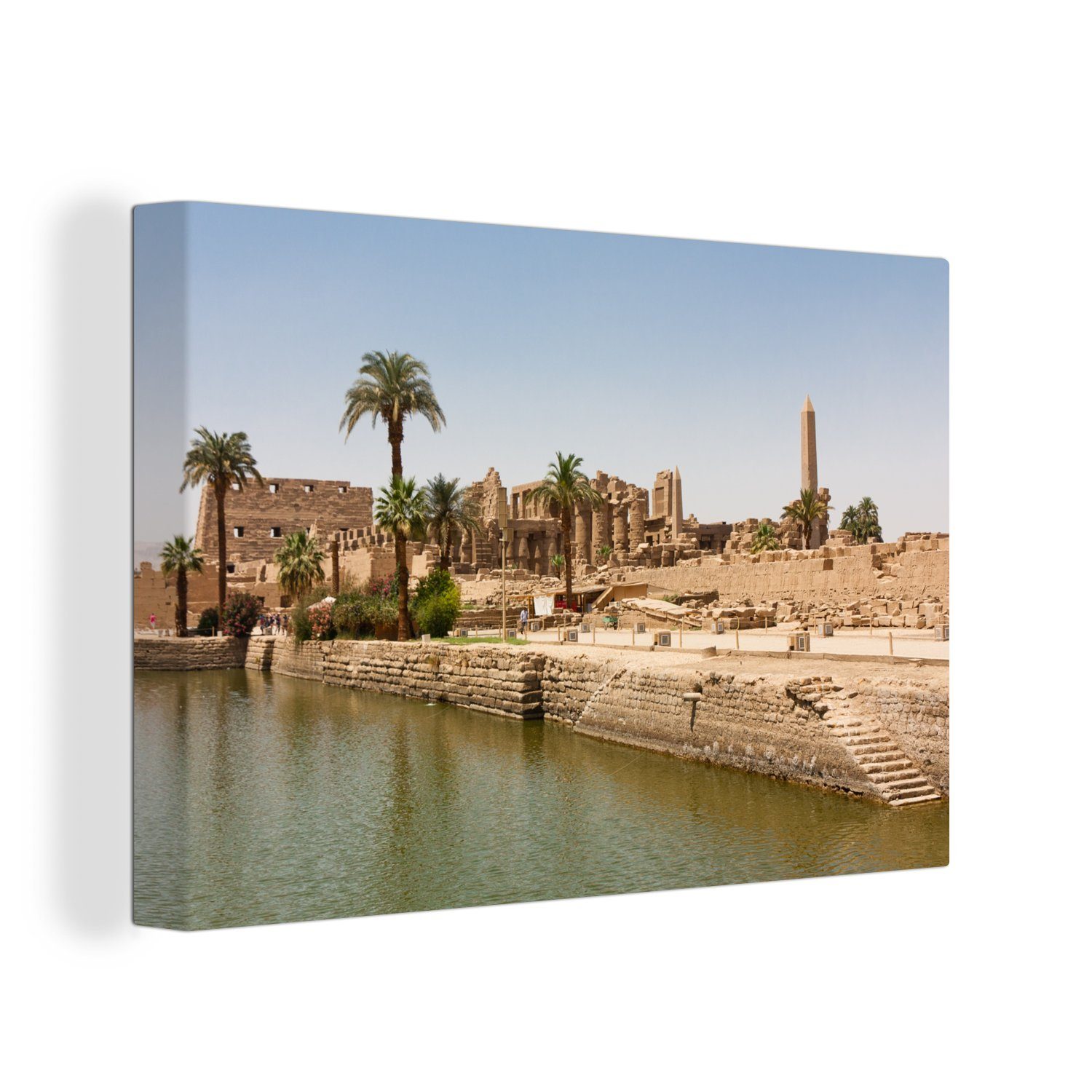 Das Allerbeste OneMillionCanvasses® Leinwandbild Der Eingang cm Karnak-Tempelanlage Leinwandbilder, Aufhängefertig, in (1 Fluss Wandbild dem 30x20 Ägypten, St), mit zur Wanddeko