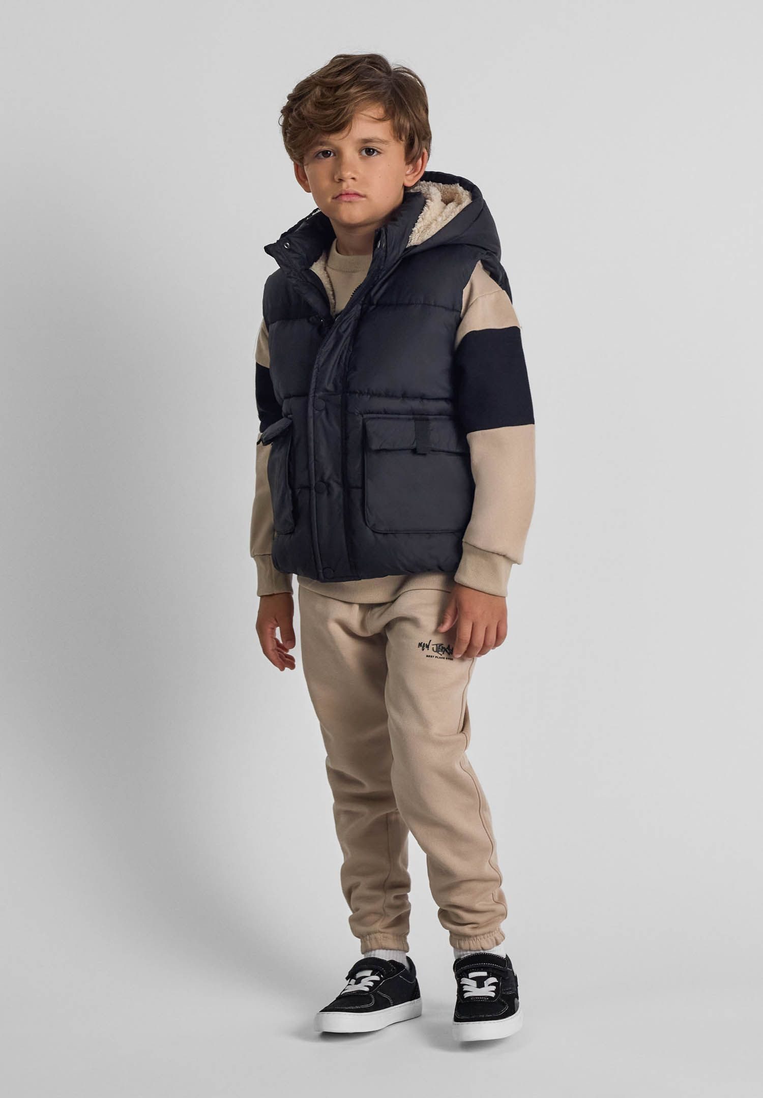 MINOTI Steppweste Tolle Weste mit Teddyfutter, Kapuze und Druckknopftaschen (9m-8y)